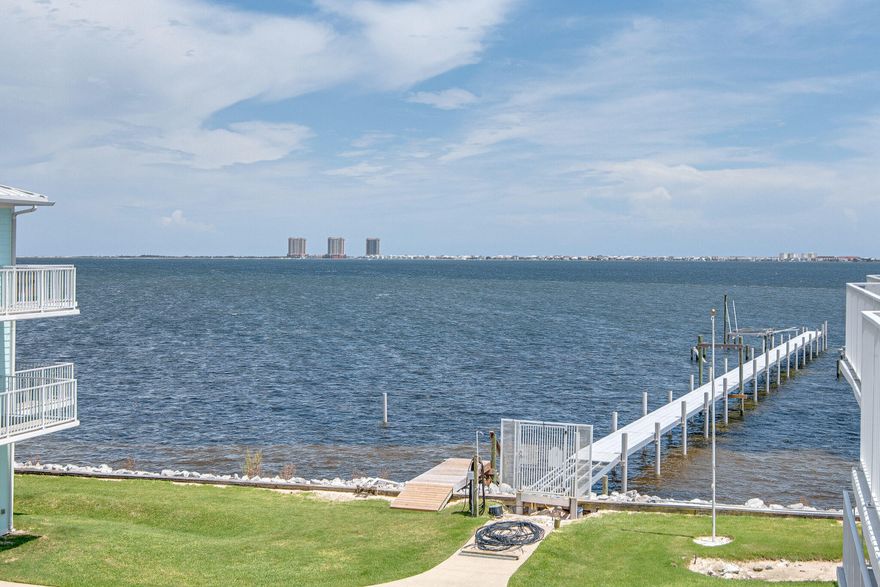 This charming townhome located on the sound in Gulf Breeze is the perfect opportunity to own your own piece of paradise!  Whether you sit on your balcony and watch the peaceful waters or you make the short drive to Pensacola beach and stick your toes in the sand, you'll love every minute of calling this 'home.'  Boasting 4 bed/ 3ba and over 2300 sqft, this definitely has room for you to stretch your legs.  Too tired after a long day at the beach to take the stairs?  No problem!  Take the elevator!  The spacious kitchen has plenty of cabinet and counter space and is open to the large living area.  The windows and sliding glass door that leads out to the patio provides plenty of natural light, making the home feel bright and inviting.  Hungry and want to go somewhere nice for dinner?  You're within a short driving distance from some of the largest dining and shopping areas around.