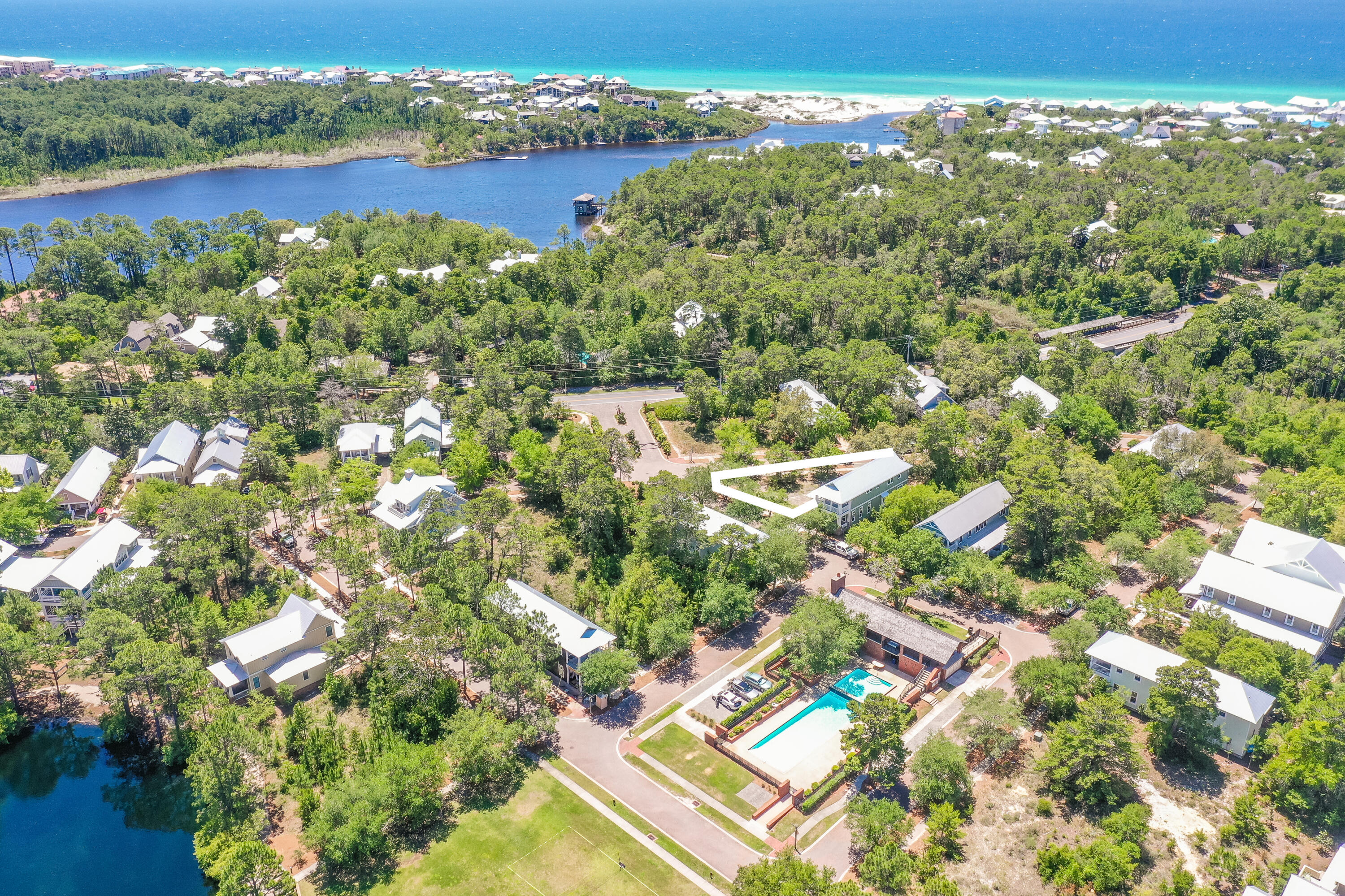 Fabulous opportunity to acquire a corner lot in sought after Forest Lakes. Forest Lakes is a lovely gated neighborhood on the west end of 30A where nature abounds. With two nearby beach accesses and easy access to Blue Mountain and Gulf Place, Forest Lakes paints the perfect canvas for the laid back 30A lifestyle. Bordered by state forest on the north side, Forest Lakes is nestled amongst towering trees. Residents enjoy walking trails, fishing in the stocked lake, a playground, and a large pool area featuring two heated pools, restrooms, an outdoor kitchen, fireplace, gaming tables, and a large gathering space for neighborhood events. This lot is one of only a few tower lots remaining, which allows for the largest footprint on a third floor!