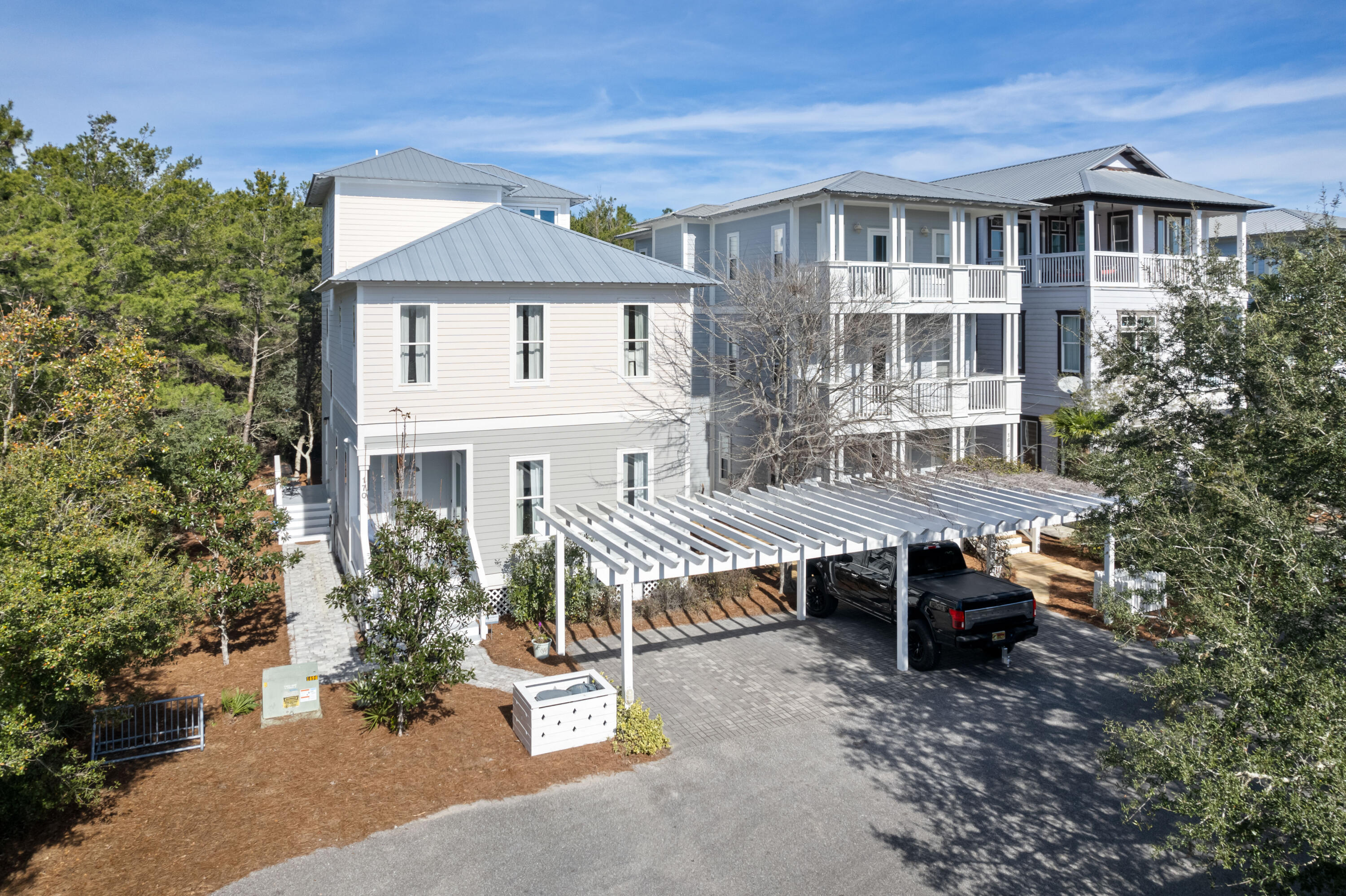 You will think this home is out of a magazine due to its design touches and attention to detail. This gorgeous home is located in the Cottages at Camp Creek and mere steps from the deeded access of the white sandy beach and crystal clear water. Located close to Aly's Beach, Rosemary and the Hub, it is a perfect location. This 4 Bedroom 3 full bath home is ideal for a primary, secondary or investment home. The open floor plan offers a spacious family room, dining area and a large kitchen with incredible marble island. Large custom refrigerator to help accommodate the needs of all your family and guests. Also, the first floor offers a custom full bathroom and a full size laundry room. The backyard is a wonderful place for your morning coffee or for relaxing after a day at the beach.