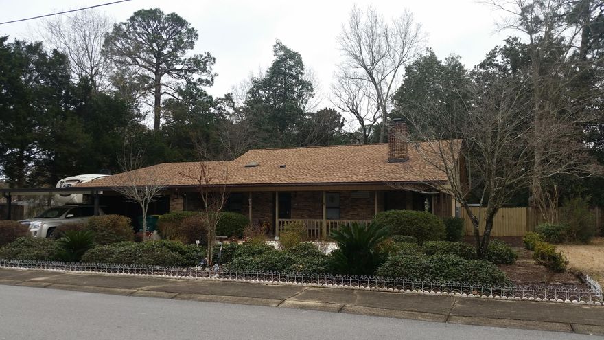 Welcome home! This ranch styled home is a must see! Upgrades all throughout, including a new roof in 2011 with a 30 year warranty. Inside the living room there is a fireplace recently upgraded from wood burning to gas in 2013 with a new 2014 cover on the chimney. Neutral colored carpet was replaced in 2011. Kitchen has stainless steel appliances with new stove installed in 2011. There is a cozy covered porch located off the kitchen that has new french doors from 2013 with the integral blinds to help keep the cold in during the summer and the heat during the winter. The landscaping is one of the best features of the home; providing easy maintenance year round and outside structures, such as an open porch off the master bedroom and a gazebo, to enjoy the Florida weather!