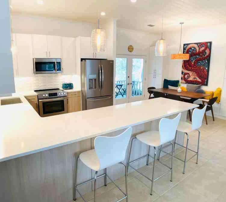 Welcome to 15 Maple Street, a hidden gem one block off 30A. This location has it all! Conveniently located 2/10 of a mile to the nearest beach access at Gulfview Heights you will never have to fight for a parking spot again! Enjoy bypassing the traffic on 30A by accessing 393 from the back of the neighborhood. Within one mile, choose from a variety of restaurants including Shunk Gulley, Mimmos, Local Catch and more. Hop on the Longleaf Pine Greenway Trail that is 3/10 of a mile from your front door and enjoy an afternoon of hiking. This home enjoys 2,043 sq feet under roof; 1,637 heated and cooled sq ft and 406 sq ft covered and screened-in porches. Mature landscaping beautifully details the large, almost 1/4 acre corner lot. In 2022, the kitchen received a makeover bringing it