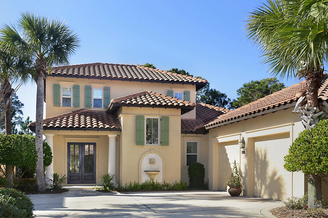 Elegant Mediterranean-style villa with private pool on the 7th hole of the Raven Golf Course located in The Vineyard at Raven Oaks, a prestigious enclave evocative of the Old Italian countryside within gated Sandestin Golf & Beach Resort. Essential to the architectural style, this home offers plenty of alfresco living with a screened-in heated pool; elevated spa; well-equipped summer kitchen with refrigerator, grill, 2-burner cooktop, and beer keg cooler/tap; and small garden (HOA approved). Over $100K was spent on the lanai/pool in 2013. The open-concept gourmet kitchen features travertine floors, 6-burner gas stovetop, desk, soft-close cabinets, pantry, and breakfast bar. The living room offers a gas fireplace, golf course views, and beverage center with wine cooler, and ice maker... Master suite features hand-scraped hardwoods, expanded sitting area, large walk-in closet, and en suite with dual vanities, dressing table, soaking tub, and separate shower. The fourth guest room//bonus room is accessible through the home or by a private entrance. 2 guest suites on the 2nd floor give guests privacy. The Raven Golf Club, which was home to the 2006 and 2007 Boeing Championship - a stop on the PGA Champions Tour - is a visually stunning 6,900-yard par 71 that winds through the marshes and pines of Sandestin.
