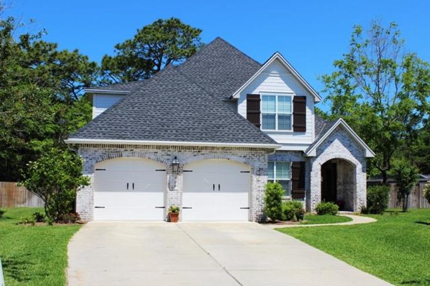Breathtaking is an understatement...this 2 story 4 bedroom, 3 bath home was custom built by Huff Homes & has approximately 2,800 square feet of living space. You enter the beautiful foyer and are drawn to the office/bedroom double French doors as you enter the open concept kitchen, dining living space. This kitchen jumped out of a Southern Living magazine with updated cabinetry, designer back splash and countertops, stainless appliances, gas oven/stove! The light fixtures in this house are conversation pieces but the barn doors steal the show! Downstairs features the oversized master bedroom & master bath. Master bath has a double vanity with custom mirrors, separate tub and walk-in shower. Upstairs is home to the two additional bedrooms as well as a full bath. Large bonus/play area