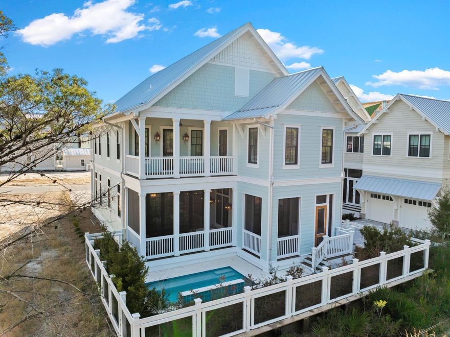 Newly Built  Fully Furnished  Priced to SellTucked away in WaterColor's final and most private phase, this new turnkey luxury home backs to the untouched beauty of the State Forest--offering rare privacy, peace, and proximity to all the amenities that define the 30A lifestyle.This brand new home is thoughtfully designed for comfort, elegance, and ease. Sold fully furnished and enhanced with new plantation shutters throughout, it features:4 bedrooms | 4.5 baths2 living areas (one up, one down) for flexibility and family fun2-car garage with EV charging + bonus storagePrivate elevator and dual laundry roomsCustom wet bar with wine fridge, perfect for entertaining The heart of this new home is the beautiful kitchen, complete with white Shaker cabinetry, white oak island, Wolf range, Sub-Zero fridge, Cove dishwasher, and an oversized island made for gathering!

A wall of bi-fold glass doors opens fully to a screened porch  blending indoor luxury with outdoor serenity. Relax by the splash pool with spillover feature, host happy hour from the outdoor summer kitchen, and unwind with forest views as your backdrop.

Upstairs, the primary suite is a true sanctuary with custom built-ins, and there's a second beverage bar in upstairs living area for added convenience.

Additional features include:

Beamed ceilings, designer lighting, and warm wood floors

400 sq ft of attic storage

Gas fireplace

Located in the non-rental phase of WaterColorperfect for primary or second-home owners

Enjoy access to the exclusive WaterColor Beach Club, Camp WaterColor, trails, parks, and more. With a motivated seller who is willing to consider a trade, this new home is dialed in and priced to selldon't miss the opportunity to own one of WaterColor's finest new homes. 