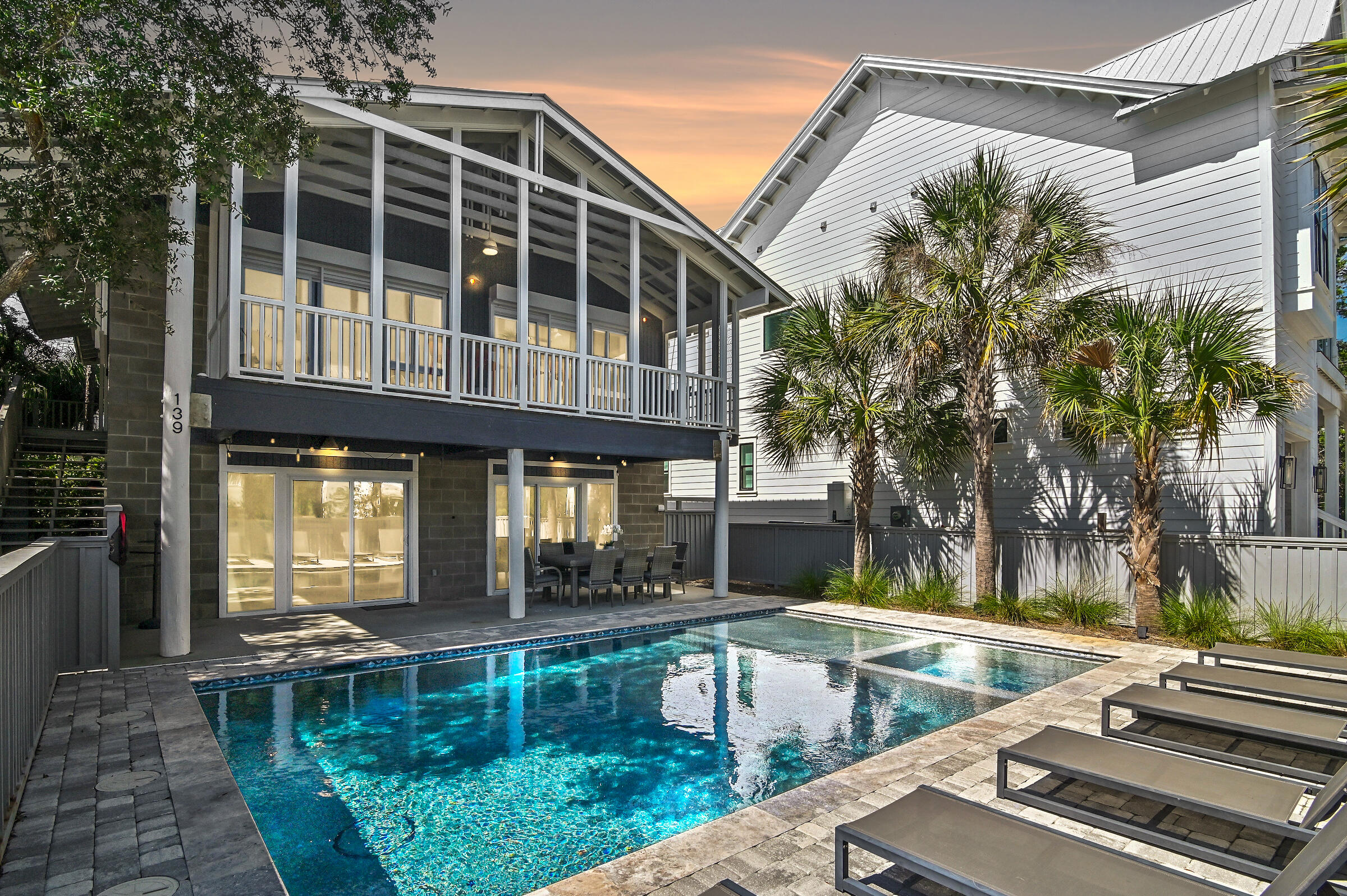 HUGE PRICE IMPROVEMENT: Experience coastal living at its finest in the newly renovated Old Florida beach retreat. South of 30A, this stunning, furnished home boasts a lagoon-style heated pool with a spa, hot tub, and a shallow edge perfect for tanning or children's play area. Enjoy outdoor dining and relaxing in your private oasis. Open kitchen features European appliances with induction cooktop. Relax in the large family room with arcade and cinema wall. With a brand-new roof and modern upgrades throughout, this coastal retreat is ready to be your dream home! Located just two blocks from the sugar white beaches and Eastern Lake, you'll enjoy the convenience of beach days without crossing 30-A. Nearby, explore incredible dining, shopping, and a state park, all accessible via the 30A path. Impressive rental potential of $90K+/year coupled with the custom finishes and upgrades makes this home is a compelling opportunity for both investors and second or full-time residents alike. Inquire today to arrange a private viewing and start living the coastal lifestyle you deserve.