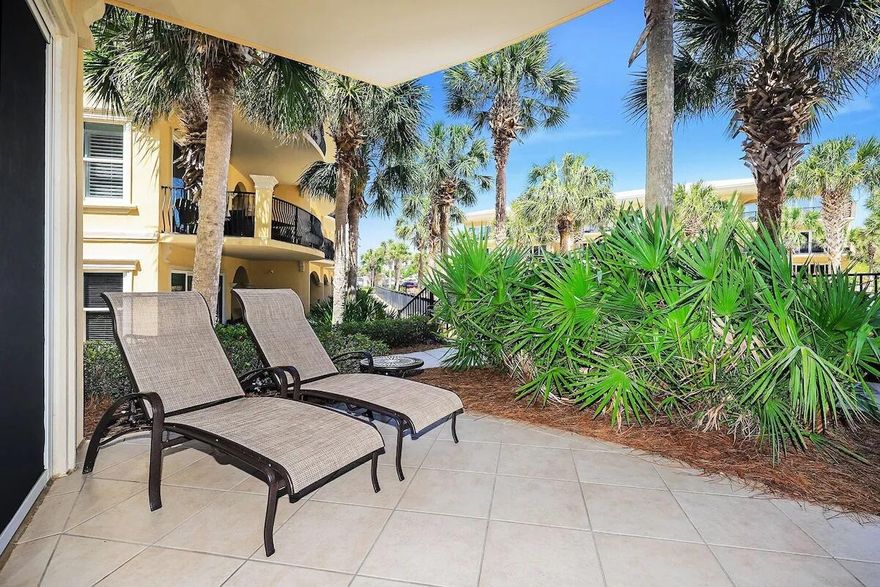 This lovely ground floor poolside corner unit brings in so much light and boasts rental income approximating $92K each year through Adagio onsite mgmt co.  G101 is generally one of the top two poolside income producers at Adagio annually.  Ground floor end units are highly desirable due to windows on the side of the unit and no stairs or elevators to contend with and direct access to the beach walkway. Travertine flooring throughout the unit...no carpet.  Enjoy opening your patio door and walking right out to all the amenities Adagio has to offer including the 8000 gallon 3 tier resort pool and hot tub.  The G bldg enjoys morning sun and afternoon shade!  Just a few feet away is the fitness room and the heated gulf front infinity pool with 600 feet of private beach front. Inside you will