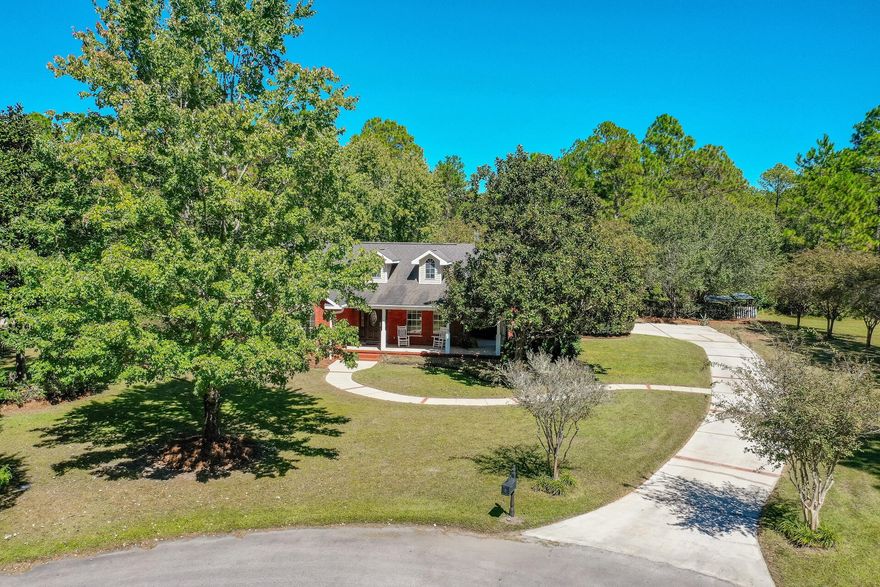 BEAUTIFUL RENOVATED HOME ON .79 ACRE IN FANTASTIC BAY FRONT COMMUNITY. Live the resort/waterfront lifestyle w/o the waterfront price. Located in the exclusive Bay Harbour S/D, take an early morning paddle board ride & enjoy the evening sunset from the community dock, just a short stroll away.  Burn some calories on the walking trails or tennis courts & then grab your boat from the community storage  & within 10 minutes, be on the Bay for a day on the water!  NEWLY RENOVATED, fresh interior paint, new Acadia LVP flooring throughout & new Quartz counters including a large, flat eating bar take center stage. Offering a split F/P, the large master BR & master bath are located away from the other BRs.  Other features include high, vaulted ceilings, new refrigerator, & large laundry rm. NEW ROOF (to be installed prior to closing), New HWH & 6 year HVAC provide peace of mind. 140 SF screened porch & large back patio allows you to enjoy the Fl. lifestyle & the GIANT .79 acre lot w/19 blueberry bushes & 2 lemon trees provides privacy & plenty of room for a pool. Located at the end of a cul-de-sac and next to a large natural preserve owned by the HOA which will never be developed, enjoy complete privacy & your own quiet piece of paradise.