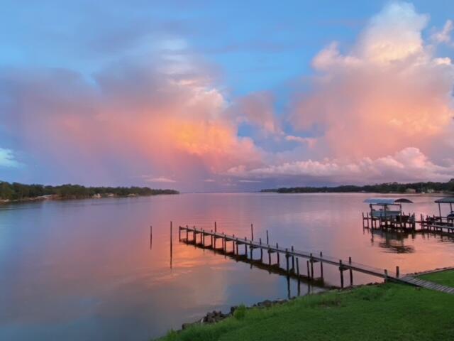 Beautifully remodeled waterfront end-unit townhome with dock. Only 5 minutes from Eglin & easy commute to Crestview/Duke Field. Whether it's watching the dolphins play or walking, biking, kayaking to nearby Lincoln Park or a favorite restaurant, you'll love the Florida lifestyle that comes with this gorgeous property. 1 pet maximum and owner approval required. 1 year lease with Military Clause. No Smoking or Vaping