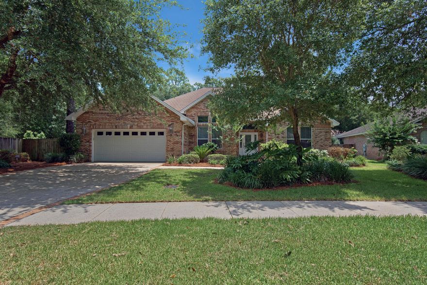 Four bedroom POOL home in the highly sought after neighborhood of Swift Creek! Come see this custom built, all brick, single story home with 4 bedrooms, 3 full bathrooms, 2 dining spaces and 3 living spaces today! Located across the street from the neighborhood park/playground, this very large fenced yard provides privacy and tons of space to play! A NEW ROOF tops off this gem for added piece of mind. Outback you'll find a beautiful screened lanai to offer relief from the summer sun and insects while inside features high ceilings, crown molding, recessed lighting, tray ceiling in the master bedroom, a separate laundry room, granite counter tops in the kitchen, travertine stone floors throughout (with carpet only in bedrooms), a gas fireplace in the family room, a large breakfast bar at the