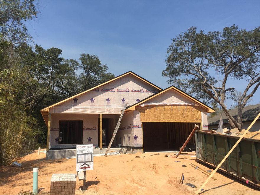 Great location in Freeport! Just 1/2 mile from the 331/20 intersection . . Craftsman style home on cul de sac street in Canopies! Hardiboard exterior with brick skirt, 2 car garage and nice covered front and back porch. Interior 9' ceilings, 8' entry doors, stainless appliances, granite, beaded cabinetry and more! The Canopies has a community pool and playground for owners to enjoy. Low association fee of only $360/year. Builder offers 1, 2 and 10 year warranties and closing costs paid (except prepaids) with approved lender!