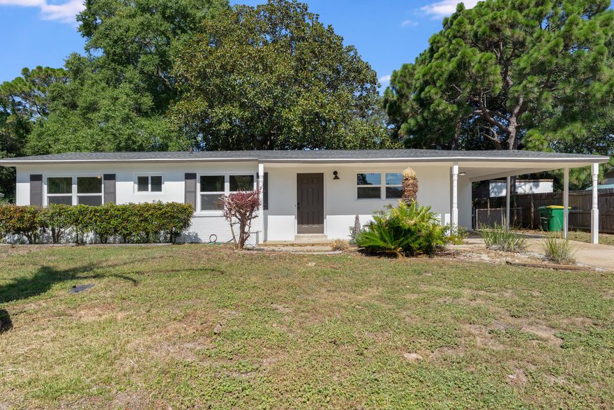 Welcome Home! This 4 bedroom 2 bath in the heart of Mary Esther has been fully renovated and is ready to go! Brand new roof, ac, water heater, windows, full house rewire. New paint and trim throughout, new LVP flooring, new kitchen and bathrooms. Access the home from both Hollywood Blvd and Mary Esther Cutoff. Right in the middle of town. Close to everything, both bases, including beaches only 15 minutes away! UPDATE: Magnolia Tree in the back yard has been removed as of 8/18.