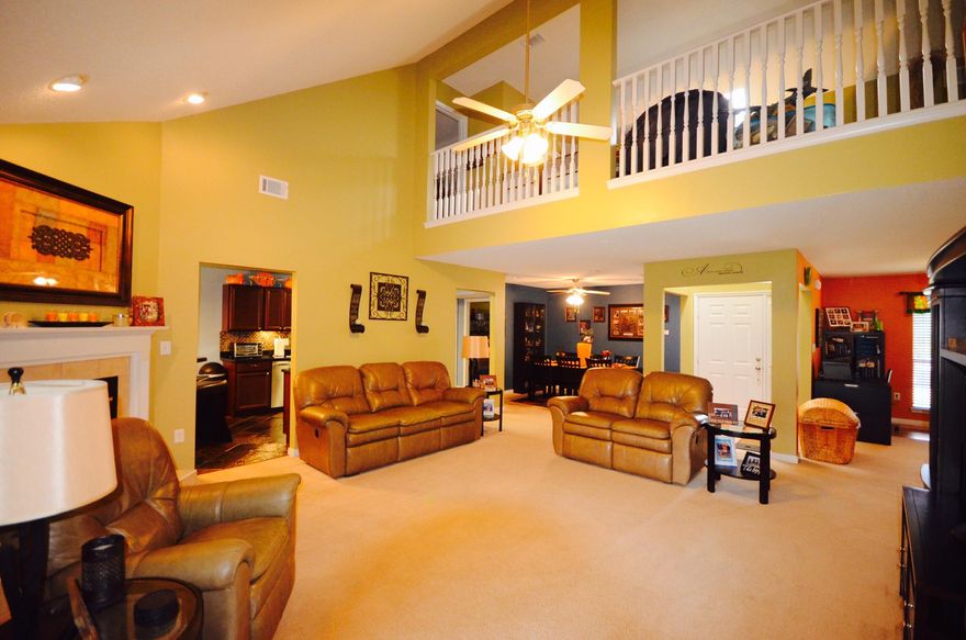 This is the one! Beautiful home sitting on a large lot in a quiet neighborhood. The entryway opens to a large living area with vaulted ceilings. The fireplace in the room begs for family time in the winter months. Separate dining room and office space are easily accessible from this area. The upscale kitchen has gorgeous cherry cabinetry and quartz countertops. A full bath and bedroom are just down the hall. The Large Master Bedroom Suite and bath are also located on the first floor.Upstairs you will find 2 more bedrooms, a bonus room, and a third full bath. A screened porch is just off the living room offering a relaxing spot to enjoy the large fenced back yard. Children's Play Area and Two Sheds Convey. This house is ready for your family!