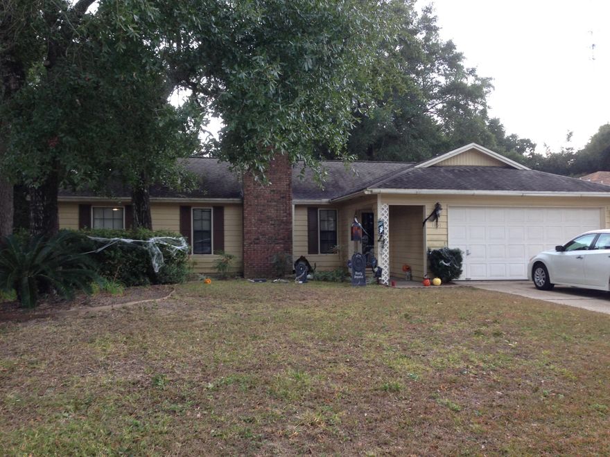 Beautiful home with large updated kitchen. Nice large backyard with a screened in porch.