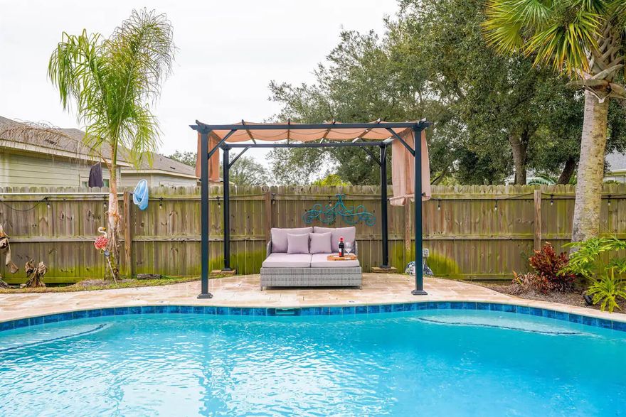 This backyard oasis was built for family fun and memory-making. Just steps out the back door is the large free-form pool. Home offers a split floor plan, with a huge kitchen island and a separate eat in dining room.

Located within minutes of Hurlburt Field, as well as the famous Navarre Beach!