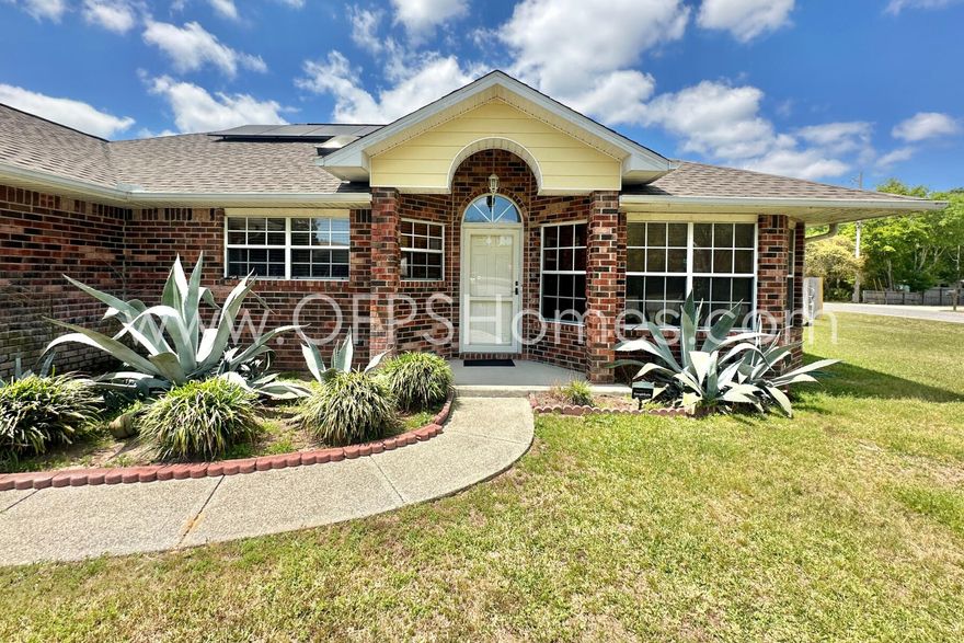 HALF OFF FIRST MONTH'S RENT!! Welcome to your next coastal retreat! Located just minutes from the Navarre Bridge and the beautiful Gulf beaches, this well-maintained 3-bedroom, 2-bathroom home offers both comfort and convenience in a prime location.Step inside to a bright, open-concept layout that features a spacious living room flowing seamlessly into the kitchen and cozy breakfast nook--perfect for everyday living or casual entertaining. Need a home office, playroom, or guest space? The flex room with French doors provides the versatility you need!Enjoy indoor-outdoor living with an enclosed back patio just off the main living area--ideal for relaxing year-round. The fully fenced backyard offers plenty of space for pets to roam or for hosting weekend gatherings. One of this home's most competitive features is the solar panel system, providing significantly lower monthly electric billsa major bonus for long-term savings and eco-friendly living. Contact the power company for details on their metered net program. 

Additional features include a two-car garage, an AS IS washer and dryer unit, and great natural light throughout. 

** Fees Required once an application is approved include, but may not be limited to: Security Deposit, Non-Refundable Fees (cleaning and rekey), $20 Certified Mail Fee, and Pet Fees (when applicable). ***

NO smoking. 600 minimum FICO credit score required in addition to meeting rental criteria. Pets allowed upon approval with a non-refundable pet fee and with a Petscreening.com report.