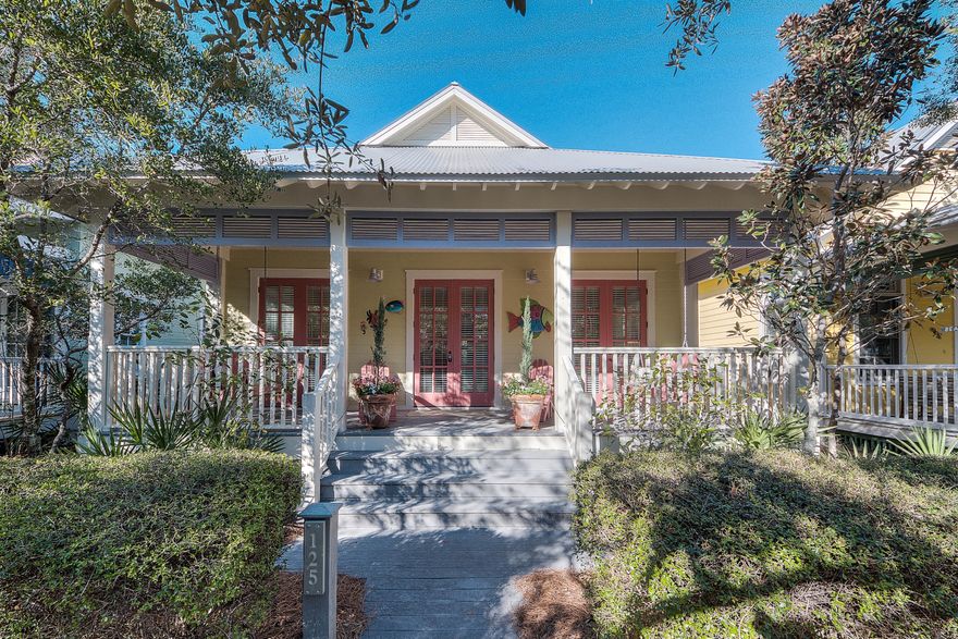 Quintessential one story Watercolor Beach Cottage in a fabulous location. 5 minute stroll to Seaside, Watercolor Town Center, The Beach Club, and Boathouse. Located in the coveted Rainbow Row section of Phase I directly behind the home is a neighborhood park. Being sold furnished and rental ready. Entering from Silver Laurel you are greeted with a generous front porch spanning the entire width of the home. Open concept plan allows for friends and family to gather. Wood floors, 10' ceilings, ship lap siding, special Florida Cottage style trim and extra wide baseboards are just a few of the features. The galley style kitchen with window pass through to dining room has granite counter tops and stainless appliances. The generous master bedroom has French doors opening to the rear screen