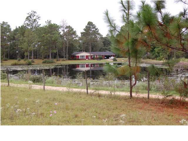 About 25.08 acres with home, pole barn, rolling/fenced pasture, pond, and good seclusion. There is paved, county-maintained access up to the property line. Almost all of the property is fenced. The spring-fed pond is estimated at over 2 acres . The home was remodeled a few years back and has a new roof, septic and well pump was replaced within the last 6 years . This property has lots of possibilities .