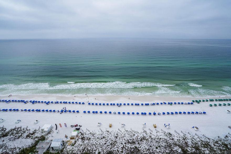 Breathtaking beachfront living awaits you in this luxurious 19th floor penthouse. Nestled right in the heart of Destin, this incredible retreat is right where you want to be near all the best local shopping, dining and attractions. The lifestyle you've been dreaming of can finally be yours in this prestigious high rise with a private 2-car garage, tennis court, swimming pool, beach service and countless other amenities - plus, this could make a perfect top-dollar rental sure to pay back your investment when not in your personal use.  From the moment you step inside, you are immediately wowed by the professionally-designed space. There is plenty of room to spread out in the open concept living area drenched in natural light.