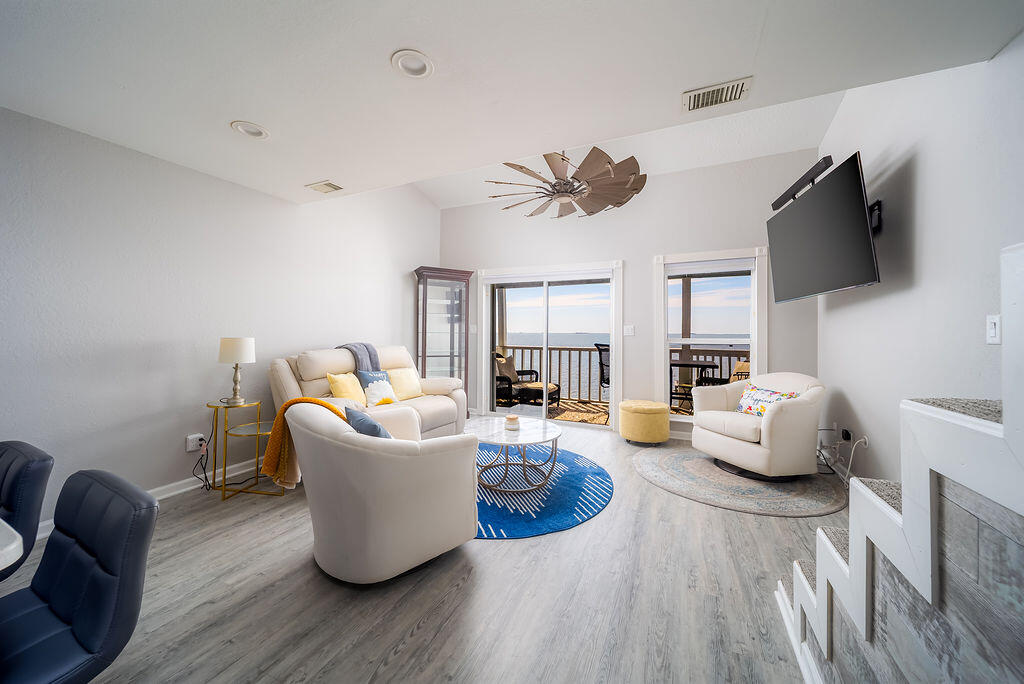 Imagine living just 11 miles from Navarre Beach or 15 miles from Pensacola Beach--better yet, being able to boat, paddle, or kayak over to the island to escape the summer the traffic! Imagine no more. Welcome to your cozy, coastal paradise. Nestled at the end of Soundside Drive, these south-facing condos offer breathtaking sunrise and sunset views of the Santa Rosa Sound year-round. This initmate,14-unit waterfront gem is designed for a refined lifestyle (and yes, no short-term rentals allowed-6 month minimum). Every detail is thoughtfully curated and fully furnished, so all you have to do is move in and enjoy. Inside, you'll find a multitude of recent upgrades from the kitchen and bathrooms to the fixtures and flooring, along with new storm doors for the sliding glass door. HVAC replaced in 2024. The exterior of the building has recently had some updates that include new siding, updated lighting, and a brand-new dock with on-site boat parking for an additional monthly cost based on availability. Every detail has your waterfront lifestyle in mind. Call today for your private showing.