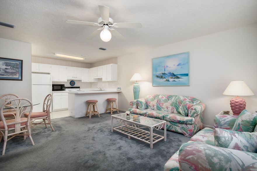 Lovely 2nd-floor, 1 bedroom, 1 bath condo with bunk beds in the hallway. The unit is located at Wendwood Condominiums in Panama City Beach, Florida. This unit has never been on a rental program, however, it would make an excellent short term rental property and could comfortably sleep 6. The unit comes fully furnished. The location is convenient and highly desirable as it is just over a mile from shopping, dining and festivities at Pier Park. Easy walk to the convenient public beach access, and parking is plentiful and allows easy access to your condo. This well-maintained community has a sparkling community pool and a community room for owner's use. Turnkey projects rental revenue at over $28,000! See Documents in the listing for more information.