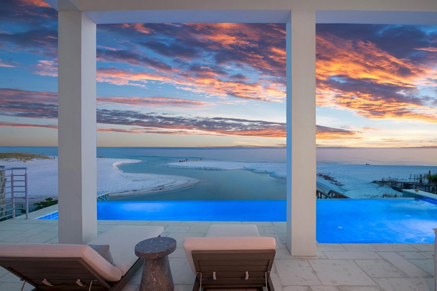 Welcome to your coastal sanctuary, a rare Gulf-Front masterpiece in Santa Rosa Beach Florida that redefines luxury living. This exquisite new build offers everything in luxury living.This five bedroom beach retreat, designed by renowned architect Geoff Chick, combines the ultimate in Coastal Elegance, including a walled and gated entry, an infinity pool blending into the Gulf as a background, an outdoor kitchen, and subtle outdoor lighting at night friendly to sea turtles,Upon entering, you are greeted by sweeping Southern views of the Gulf from nearly every room. To the East and North, patios and porches also give views of an iconic coastal dune lake stretching for miles. Each exterior room brings in natural light and sublime vistas of the Gulf, the Coastal Dune Lake, or both. This home is carefully crafted to embody the spirit of the Florida Gulf Coast Coastal Sanctuary. The gated entry ensures privacy while porches on each floor maximize your view of the different bodies of water. The open floor plan on the main floor seamlessly integrates indoor and outdoor living. The third and fourth floors have cozy, quiet places to enjoy a good read and time to reflect. Porches on the third and fourth floors continue the calm spirit, with the ability to enjoy the sound system built into the porches and main rooms throughout the house.
Whether you want solitude to enjoy family or you want a welcoming space to entertain friends, this is the house for you.