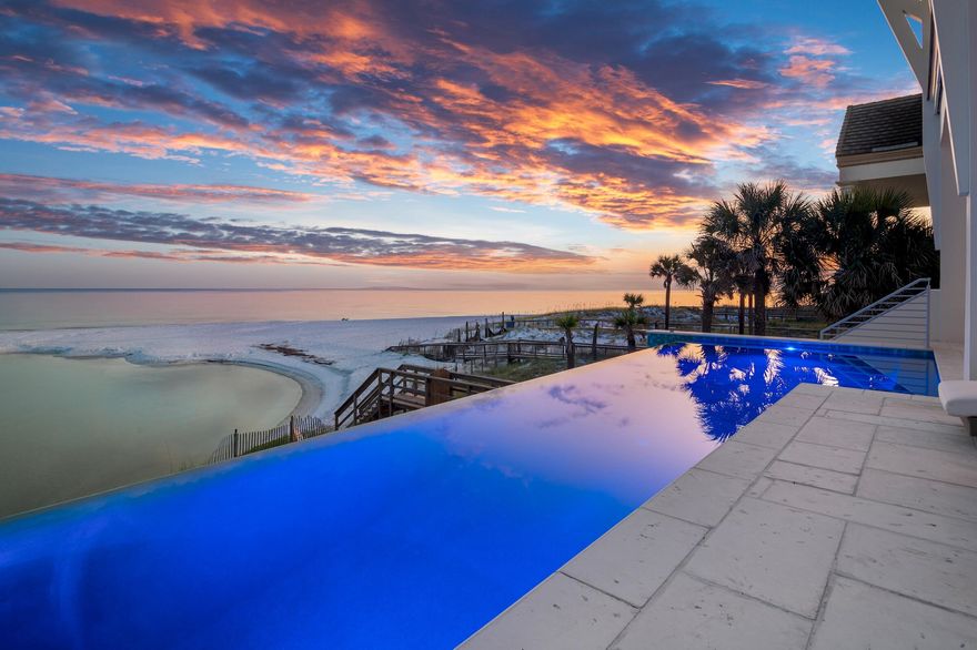 Welcome to your coastal sanctuary, a rare Gulf-Front masterpiece in Santa Rosa Beach Florida that redefines luxury living. This exquisite new build offers everything in luxury living.This five bedroom beach retreat, designed by renowned architect Geoff Chick, combines the ultimate in Coastal Elegance, including a walled and gated entry, an infinity pool blending into the Gulf as a background, an outdoor kitchen, and subtle outdoor lighting at night friendly to sea turtles,Upon entering, you are greeted by sweeping Southern views of the Gulf from nearly every room. To the East and North, patios and porches also give views of an iconic coastal dune lake stretching for miles. Each exterior room brings in natural light and sublime vistas of the Gulf, the Coastal Dune Lake, or both. This home is carefully crafted to embody the spirit of the Florida Gulf Coast Coastal Sanctuary. The gated entry ensures privacy while porches on each floor maximize your view of the different bodies of water. The open floor plan on the main floor seamlessly integrates indoor and outdoor living. The third and fourth floors have cozy, quiet places to enjoy a good read and time to reflect. Porches on the third and fourth floors continue the calm spirit, with the ability to enjoy the sound system built into the porches and main rooms throughout the house.
Whether you want solitude to enjoy family or you want a welcoming space to entertain friends, this is the house for you.