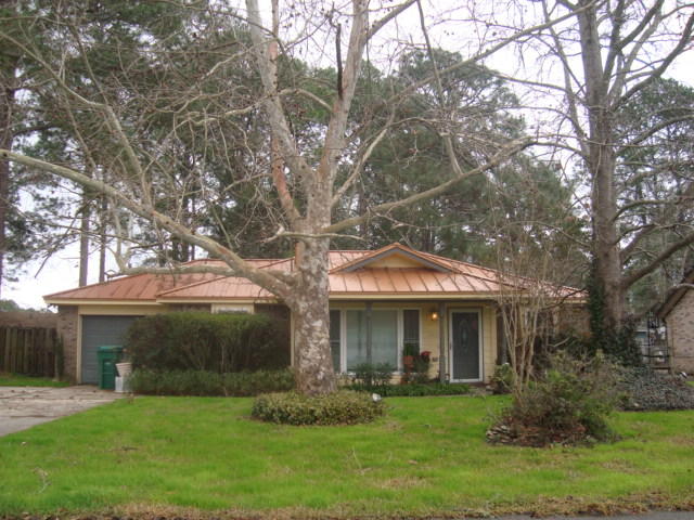 You will love this updated three bedroom cute cottage coupled with a cottage studio building in the backyard AC cooled. Walk out the remodeled galley kitchen through French doors to an inviting patio, mature landscaping enclosed by a privacy fence. Copper-colored metal roof, easy clean replacement windows, updated kitchen and baths, tile flooring, wood burning fireplace, vented garage/laundry room for pets. Other half enclosed garage is a utility room. Garage door is in place for a return to a single car garage. Kitchen features Electrolux stainless steel refrigerator and dual fuel 6-eye range, Bosch dishwasher, solid surface counter top, computer desk area, modern cabinets and self-closing drawer storage.