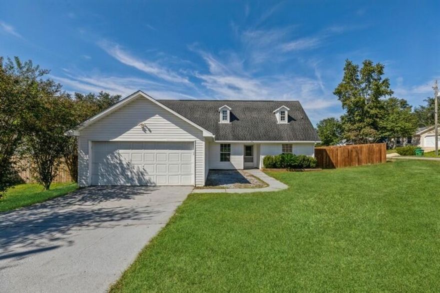 Freshly painted and ready to view.In most Southern Crestview on a corner lot, this home offers four large bedrooms and three full baths.  The home has a master upstairs and a second master down. The kitchen is large with an eat at bar, perfect for large families or entertaining. The back yard is fully fenced in with a covered patio for relaxing.
