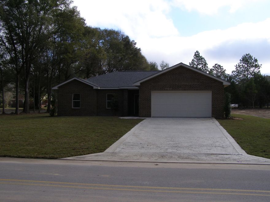 New construction on a large corner lot. Almost 3/4 ac level and all cleared that has access from two paved roads. The front access to home from Ridge Lake Rd and could have another access on Old Bethel Rd to gain access to back of the property. The home is an all Brick three bedroom and two baths, very popular split bedroom and open concept floorplan with a finished two car garage. Crown molding in the family room, dining room and Master Bedroom. The dining room has a wonderful trayed ceiling with all natural wood. Wood plank tiles in family, dining, and baths. Upgraded carpet in bedrooms. Out back you are going to love the oversized covered patio looking over the huge back yard. enough room to put in a pool or build a workshop. Come and check out the progress and the wonderful lot!