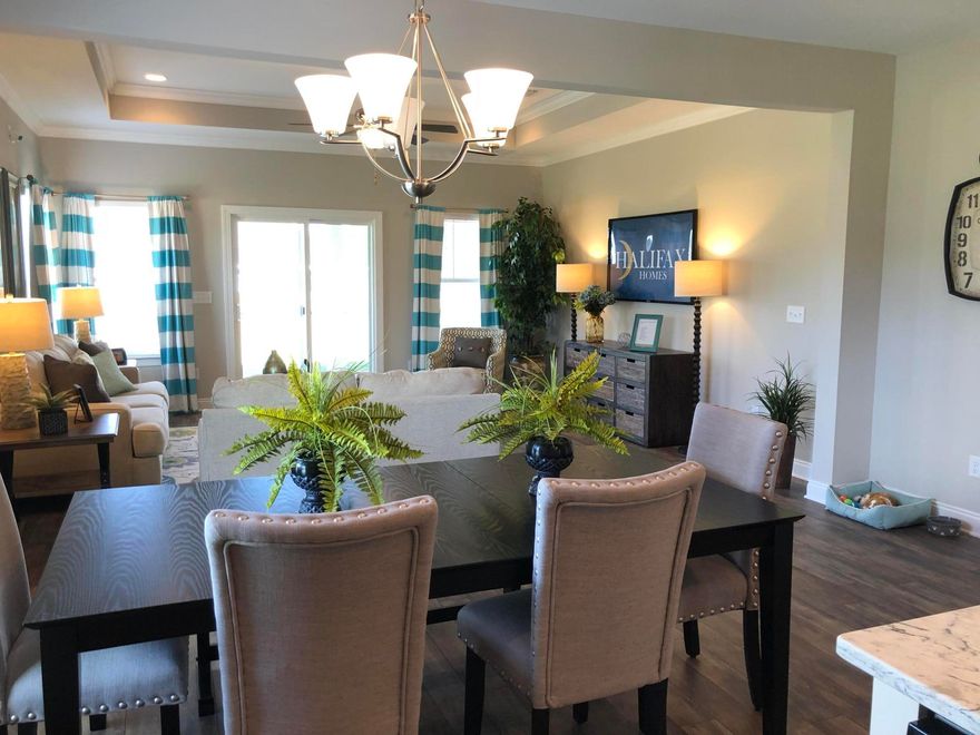 Parade of Homes Award Winning Plan. Popular granite choice in the kitchen and both baths. 42'' Linen painted cabinetry. LVF lock and click flooring throughout. Tile shower in Master bath. Large master bedroom with Mohawk carpet. Crown molding, trey ceilings, Pendant lights, recessed lights, ceiling fans, eased height cabinets are a few of the features.Quiet community close to Navarre Beach. Easy access to Hurlburt Field and Whiting Field. Pictures are of the same plan. This is not the home for sale. Home is under construction!