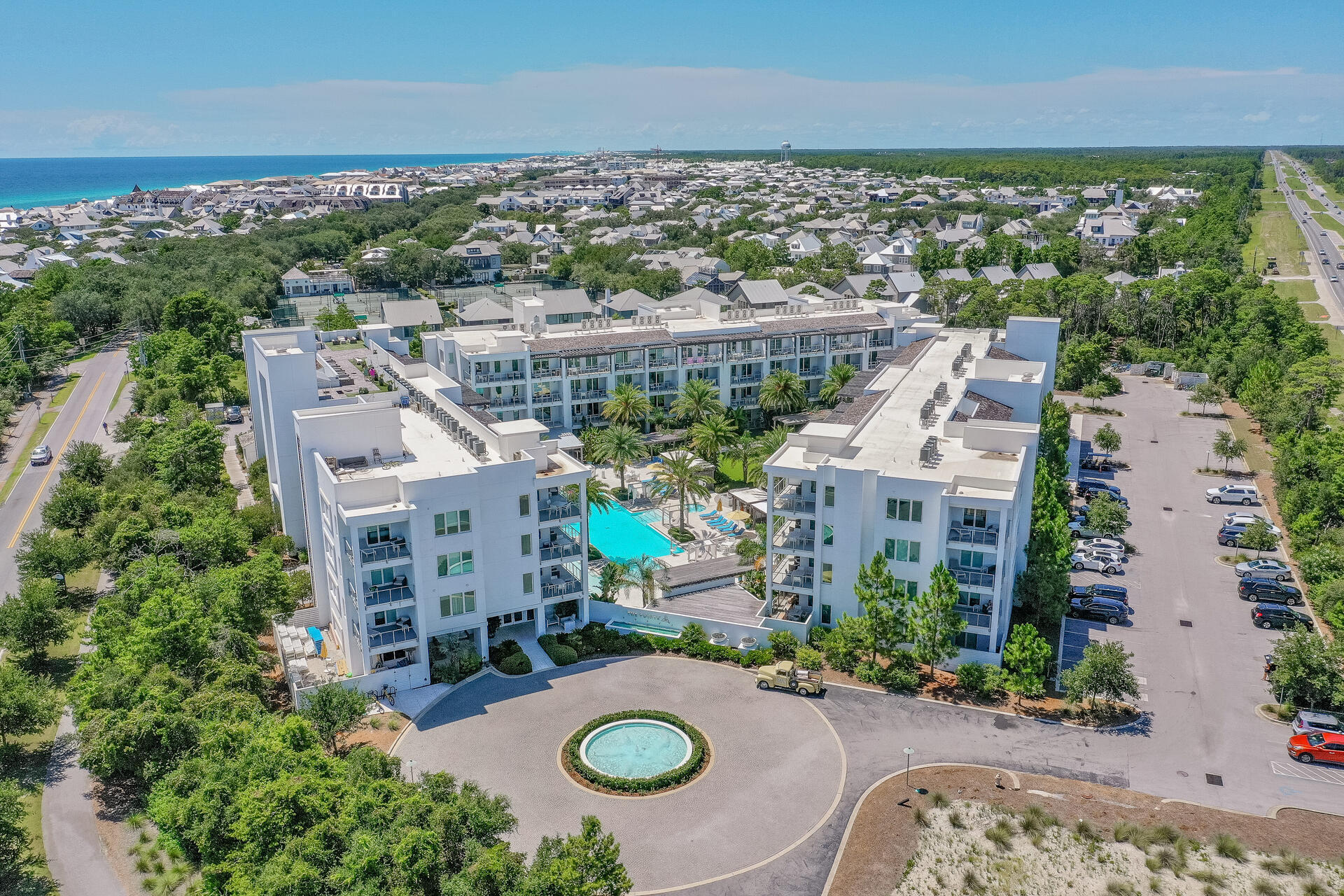 This Caribbean Pool-Front 2 bed/2 bath condo in Building 1 of The Ponte is adjacent to the Rosemary Beach community and offers direct access to the Pool, Gym and the Rooftop Bar that is perfect for enjoying the Emerald Coast Sunsets in the evening! Located at the intersection of Hwy 98 and Hwy 30A, just across the street from the shops and dining of 30 Avenue, Shades Grill and the Donut Hole, this is a coveted piece of real estate on 30A! You enter into the Welcoming Foyer that leads into the open floor plan Kitchen with Large Island, Gourmet Appliances and Recycled SeaGlass Countertops! The Comfortable Living Room has access to the large main Balcony with plenty of seating for relaxing and eating your meals! The Main Bedroom features a King sized bed, a Desk in the nook and Private