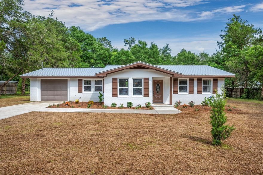 Stop the car and look no farther. This beautiful ranch style farmhouse is a must see located in the heart of Defuniak. This stunning home was took down to the studs and brought back to life inside and out. Your new home has an open floor plan that is perfect for inviting friends and family over to entertain on the weekends. Inside you are greeted with awesome finishes the second you walk in the door from the beautiful luxury vinyl plank flooring, cased out doors/windows, stained wood interior doors/barn doors, new soft close cabinets, gorgeous granite in the kitchen, a stainless appliance package, and so much more. Outside will not disappoint either with a level acre lot that is perfect for your future pool, workshop, or the place for the kids and pets to roam and just be kids.
