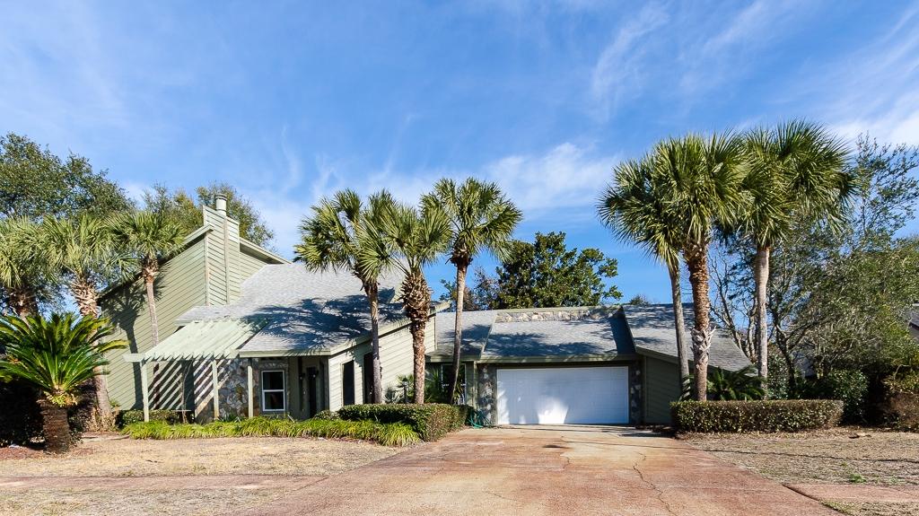 2 Story Home in INDIAN BAYOU GOLF COURSE!!! New Hardie Board siding in process! 3 Bedroom with Office/Formal Dining Room! 2 Living Rooms! Move right in to this elegantly updated home with open floor plan, plenty of natural light! This JUST GORGEOUS KITCHEN features a sleak, warm design with custom cabinets & granite counter tops created for practical movement while entertaining or just preparing tasteful meals! Take notice of the character in the detailed tile throughout, stainless appliances. Modern WET BAR w/ Wine Cooler. Breakfast area includes custom window bench & table. The shining hardwood staircase leads you to the spacious second floor master suit! You will love the double trey ceilings lined with trey lighting & inviting sun light from all three bedroom windows. Find romance in this fully tiled large master bath beginning with porcelain double sinks accented by custom cabinets and granite counter tops, followed by a separate matching vanity, Jacuzzi jetted tub, separate shower and large walk-in closet lined with custom shelves & breathtaking cedar walls! You will find 2 lovely spacious bedrooms downstairs situated between them a beautifully accented guest bathroom with custom cabinets, counter tops & lighting. Downstairs is completely tiled, master bedroom & staircase are hardwood. Pocket doors lead from the kitchen into a perfect private laundry room including sink & cabinets. You can't miss the double door entry onto your private screened in porch great for relaxing & soaking in the peacefulness of your beautiful lush back yard. HOA is only $225 Annually!
