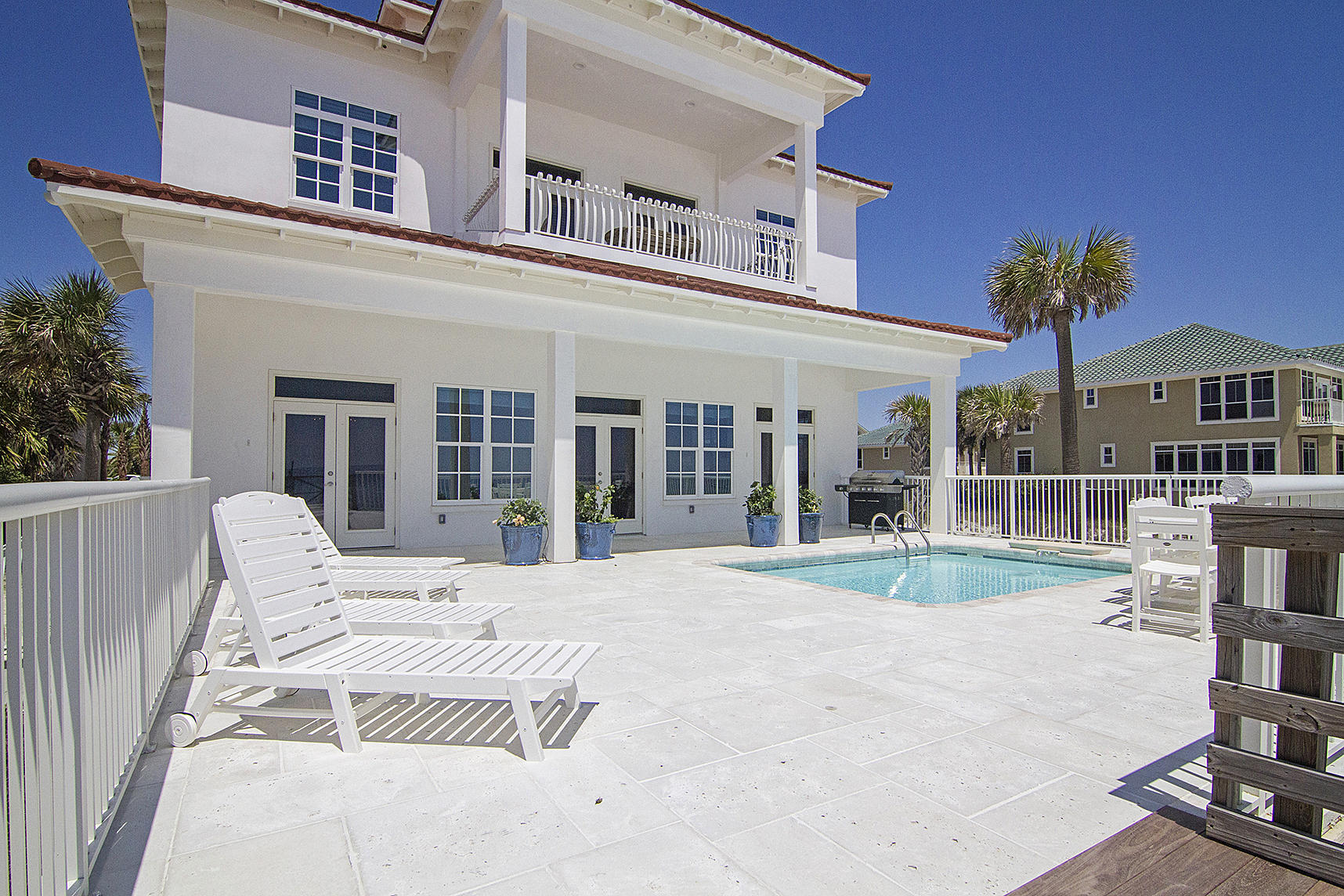 Gulf Front Remodel. This majestic home is located in Crystal Beach, Destin. Fully renovated, the 7 bedroom, 6 and a half bath home is a perfect vacation home, permanent residence or rental property. Standing three stories high, gulf views can be enjoyed anywhere in the home. The first floor is composed of the main living area, there are two sitting areas, a massive dining room, and an open kitchen. Fronting 65 feet of beach, a beautiful deck with longue chairs and a salt water pool is ideal for cooling off. Ascending to the second floor, one can take the stairs or the elevator! The second floor consists of a media room, two guest suites and two huge gulf front masters! The third floor is the perfect place for kids with two bunk rooms, another guest suite and a lovely panoramic bunk nook!