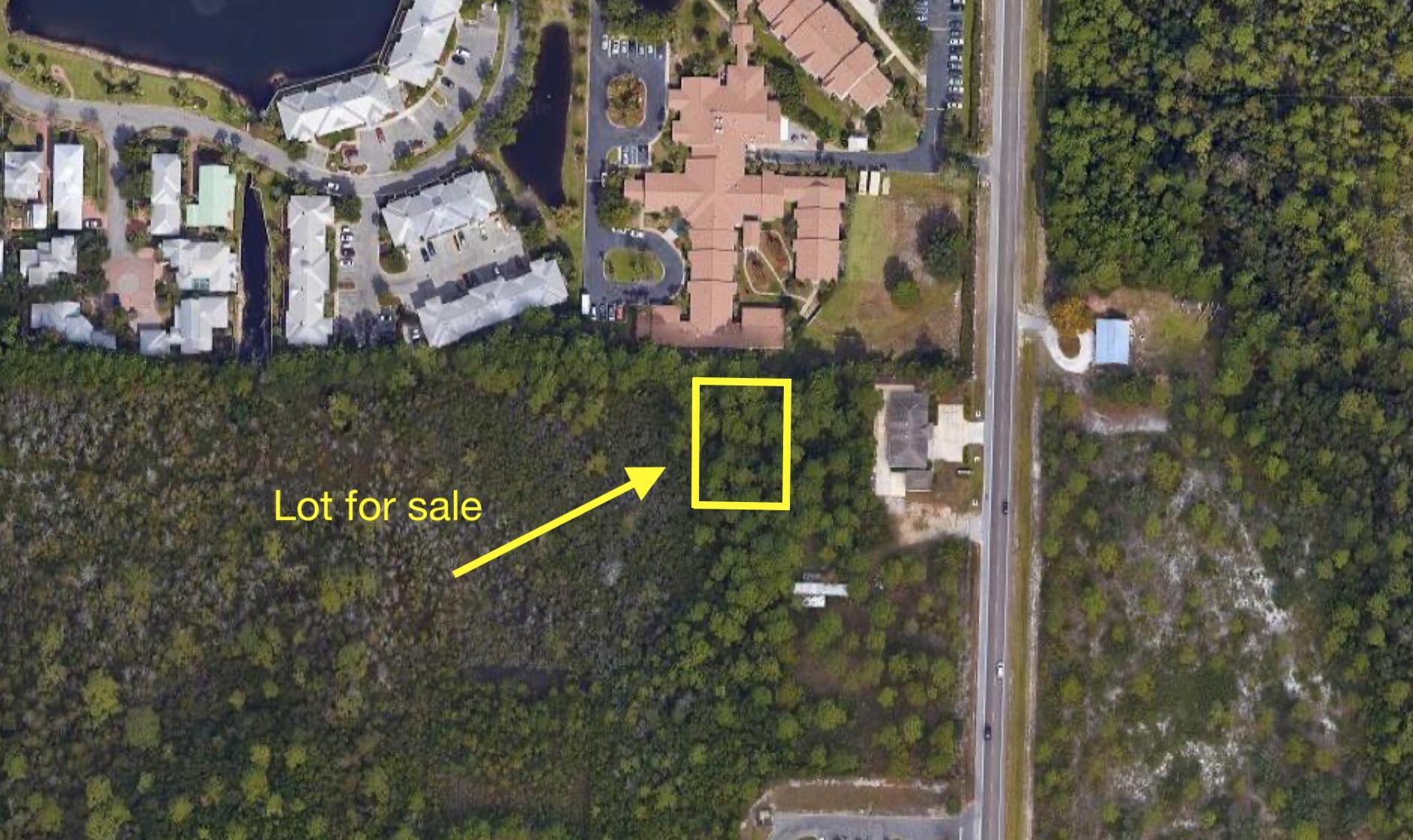GREAT PRICE on this vacant lot in Santa Rosa Beach just waiting for you to come and build! Lot is 90 x 135, wooded and currently zoned vacant. No utilities. Flood Zone X. Located behind Bella Flora 30A and Posh Pups Grooming Salon, this property would be a great residential or commercial opportunity. Short drive to the boat ramp, public beaches, shopping on Grand Blvd., etc. - And just a walk to Sacred Heart Hospital. At this price it is a STEAL and won't last long - So act quickly!