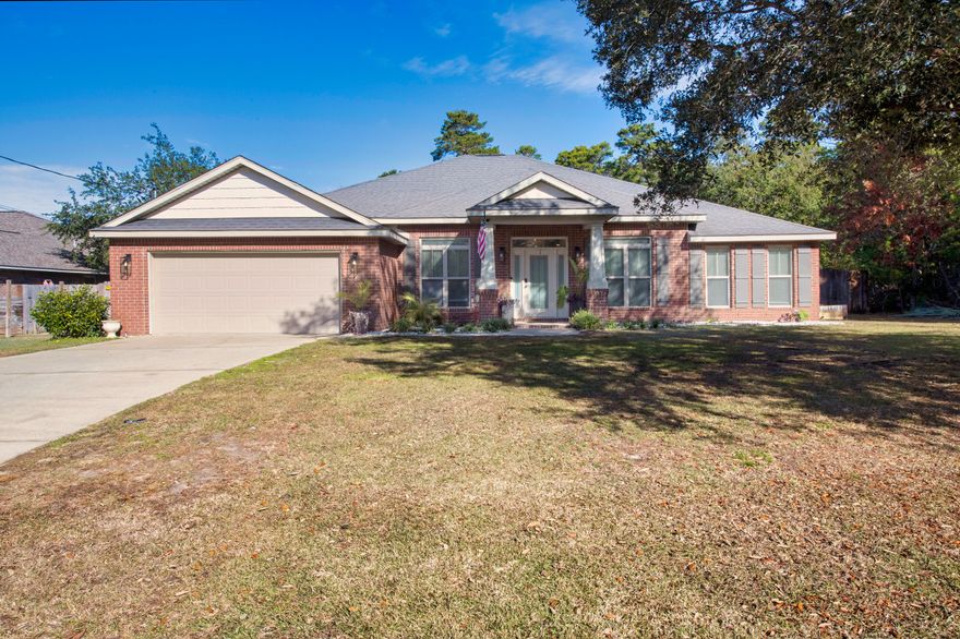 MAJOR PRICE IMPROVEMENT! Plus, 4.75% Assumable VA Mortgage! Resort-Style Living with Unbeatable Amenities! Imagine waking up every day in a community that offers a private pier, boat slip access just minutes from your home, a state-of-the-art fitness center, an Olympic-style indoor pool, and even pickleball, tennis, and basketball courts--all for just $565 per year. Holley by the Sea is the only HOA in the area that allows you to park your boat or RV in your own backyard, giving you the freedom to fully enjoy the coastal lifestyle. This stunning 4-bedroom, 3-bath home, with over 3,000 square feet of beautifully designed space, is your private oasis within this highly sought-after community. Nestled on a 1/2-acre lot, it features a brand-new upgraded pool, pool deck, and screened enclosure, creating the ultimate backyard retreat. Whether you're floating in the pool, hosting a summer barbecue, or unwinding after a long day, this home is designed for relaxation and entertainment.

Inside, the chef's kitchen is a showstopper, featuring granite countertops, double ovens, a built-in microwave, cooktop, and custom maple cabinets, perfect for cooking and gathering with loved ones. The open-concept layout, highlighted by elegant finishes and abundant natural light, creates an inviting atmosphere. The master suite is a true sanctuary, boasting trayed ceilings, a spa-like whirlpool tub, dual vanities, and a fully tiled walk-in shower. A split-bedroom design ensures privacy, with two guest rooms sharing a bath and a fourth bedroom featuring an en-suite bath with backyard access.

Holley by the Sea offers an unmatched lifestyle with exclusive amenities, including a clubhouse on the water available for private events, fitness classes, before and after school programs, and a golf course just five minutes away. This is more than just a homeit's a lifestyle. Don't miss your chance to own a slice of paradise in one of Navarre's most desirable communities. Schedule your private tour today!