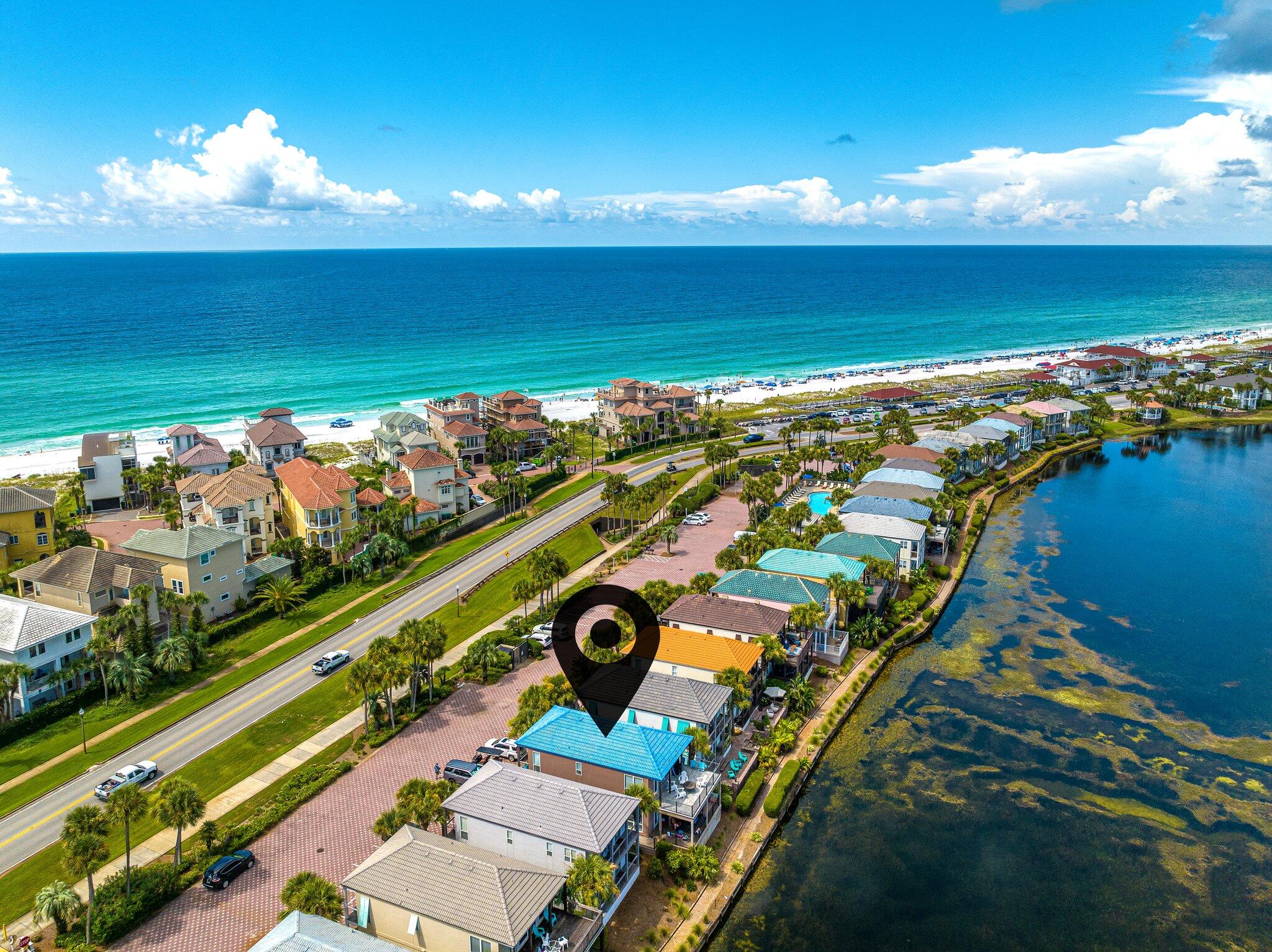 Here is your chance to own a beautiful income producing duplex with great water views and beautiful sunsets. Just a short stroll via the underground tunnel to the pristine emerald green waters and white sandy beaches of the Emerald Coast. Both units come fully furnished and rental ready. Each unit comes with (2) Bedrooms, (2) Full Baths, Fully loaded Kitchens in each unit and covered balconies on the front and back. You are able to sleep (6) comfortably in each Unit. Unit B has been recently updated with new flooring, paint, fixtures, Appliances, Water heater, HVAC system and much more. Destiny Beach Villas is only a few