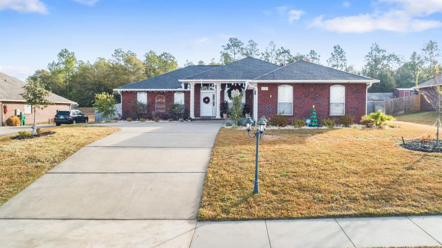 Nestled on a half acre lot in the tight knit neighborhood of Silverwood in north Crestview is this contemporary style home with over 2000 sq ft, 4 bedrooms and 2 full bathrooms. The house has been updated with wood-looking porcelain tile throughout the main living areas and bedrooms allowing for a better feel and flow thought out the living space. The kitchen is open to the living room and has ample cabinet storage, stainless steel appliances and beautiful dark granite counter tops complimenting the area. The master bedroom shows nice with trey ceilings with crown moulding trim and the ensuite is a nice private space with its own separate shower and garden tub. The back yard has been professionally landscaped to include a beautiful pergola to relax under.