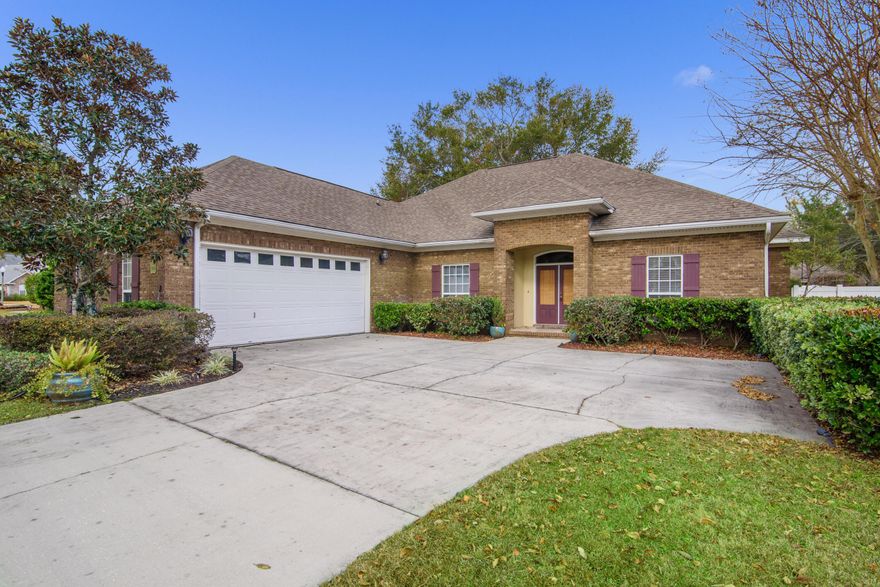 Back on Market! Due to Buyer's Default. This Gorgeous custom built house is located in Highly Desired neighborhood of Juniper Creek Estates. This fabulous home is complemented with a large formal dining area, 10' ceilings, gas fireplace, family room with built in storage units, two lanais (one off the main living area), trey ceilings, french doors, over sized bedrooms and a privacy fence. The master suite has an over sized walk-in closet, trey ceiling, private shower, dual vanities and a whirlpool tub. Juniper Creek is a private community with side walks, a private pond, and nature trails.