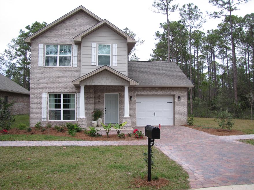 Welcome to the new community of Harstvedt Plantation. A quiet country setting yet close to 30A beaches and to N. Eden Bay park with bay access. This home sits on one of those private lots you dream of. A Wooded preserve is on the north side, green space on the east, street on the front and fenced r to the west. This beautiful 2 story, 3bedroom, and 2.5 bath home has many upgraded features selected by the professional interior decorator. Dark hardwood floors grace the floors in the large family room. The kitchen has quartz solid surface counters and a custom island. .Out the back door of the kitchen/dining area is a fabulous patio. Great for outdoor entertaining. Wooden shutters adorn the windows, upgraded door hardware, and much more. 3 bedrooms, 2 baths, and laundry room are upstairs.