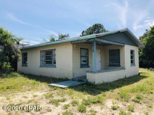 Priced to move quickly!! This block cottage is only 1.5 blocks to the beach. Bring your imagination and your swim suit. This is a great property for a number of reasons.... block home, on slab, large yard, close to restaurants and shopping. It is also close to grand lagoon boat ramp, St Andrews State Park and of course the beach! Possibilities are endless. Short term rentals are A OKCome check this out.