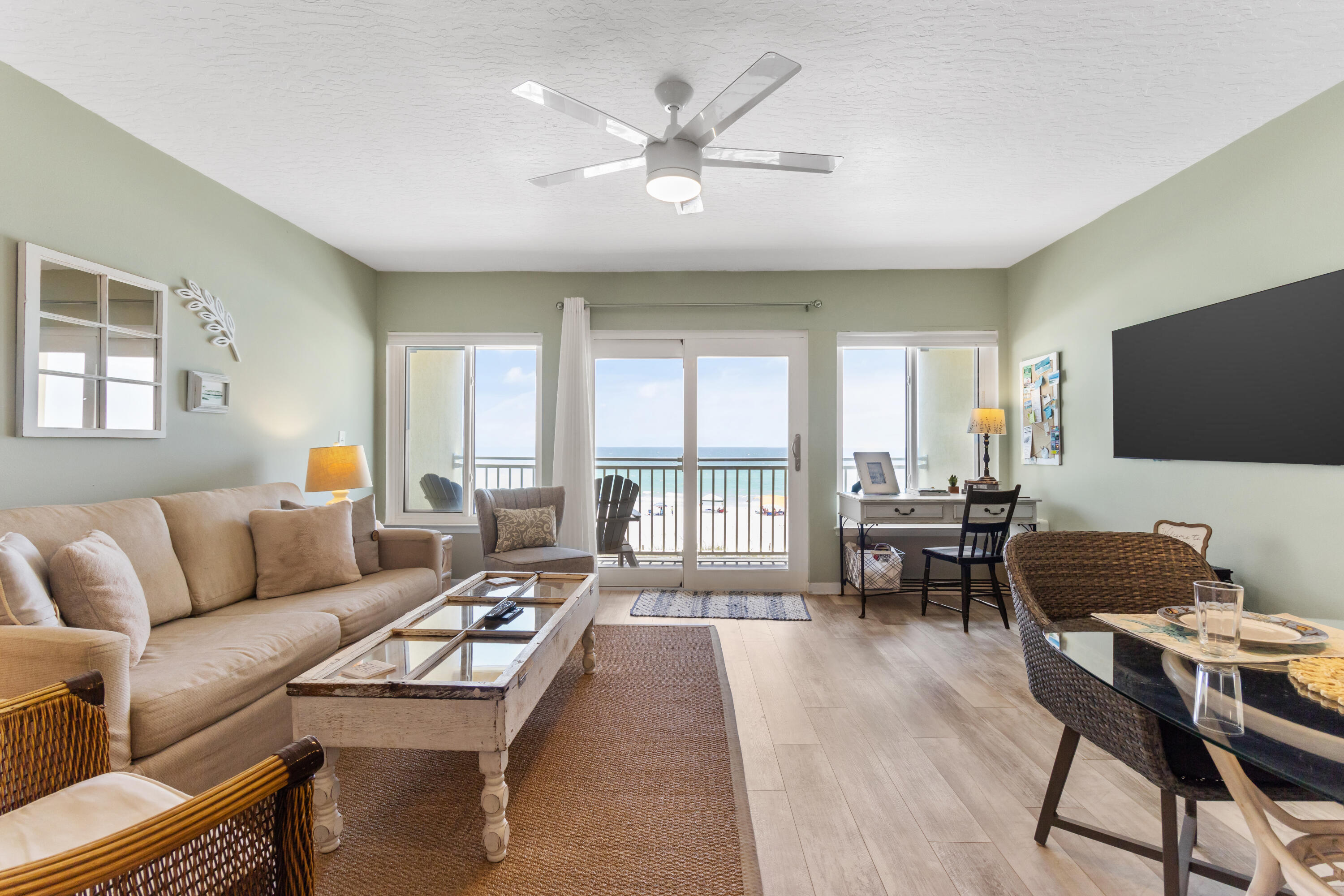 MILESTONE STUDY COMPLETE AND CLEAR!! Sitting directly on the beach, look out from your private balcony to the white sand and Emerald Green water. One bedroom, one bath, gated community. Low Density buildings are very hard to find. Only 9 units total Tiki #32 is on the 3rd floor middle unit. Gated Beach Access so you have your own private access to the beach. Great kitchen fully-equipped. Plus washer and dryer inside unit. Newly updated bathroom with new Vanity, New floors throughout, all new windows and doors. TV in living room and bedroom. 2022 rental income was $58,751.04. Over $56,000 for 2023. Great location near restaurants, nightlife, fishing and more. Rent fishing poles at the pier and catch your dinner! Water heater new in 2021, New HVAC spring of 2023. Storage closet deeded for Unit 32 on the first floor.