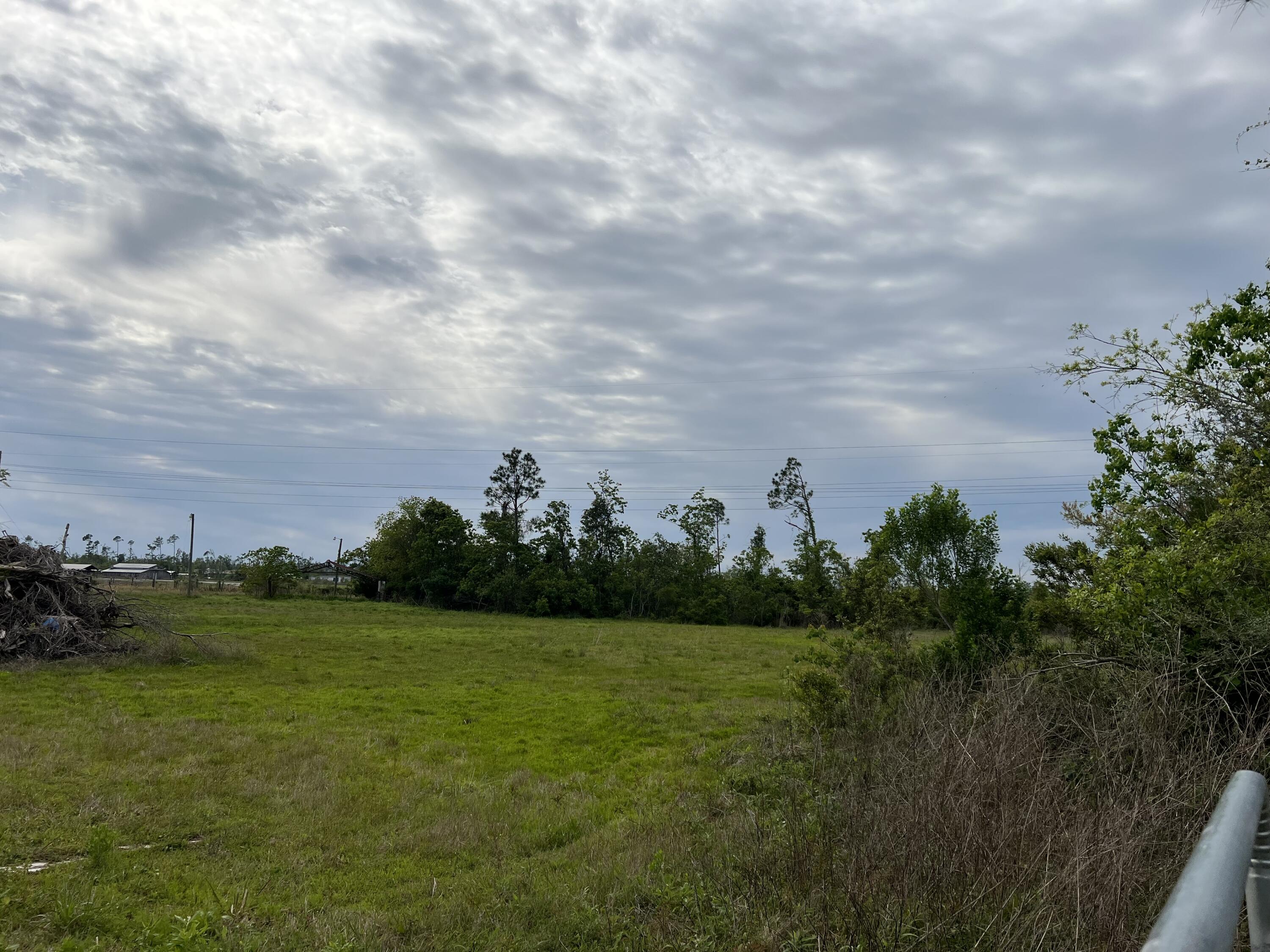BEAUTIFUL GREEN ACRES IN PANAMA CITY! Cleared piece of property. No HOA or restrictions on this property according to the seller. Zoning: R-2 Duplex/Manufactured Home. Just a little over 25 miles to white sandy beaches along the gulf coast as well as pier park in Panama City Beach where there is shopping, restaurants, and fun activities for the whole family. 17 miles to Tyndall Air Force base and 10 miles to town in Panama City. The owner used the property for their horses. It previously had a barn a on the property that has been taken down. Additional piece of land available (MLS 920312 - ECAR). No utilities on the property.