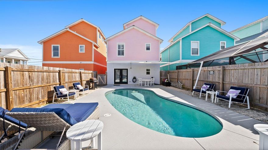 Just steps from the sugar-white sands of the gulf, this exceptional three-story beach house in Laguna Beach Estates offers the perfect blend of luxury, comfort and investment potential. With four bedrooms plus custom-built bunks, gulf views, and a private pool, this home is designed for effortless coastal living. The first floor welcomes you with an upgraded kitchen featuring quartz countertops, a farmhouse sink, and custom cabinetry, flowing seamlessly into the open living and dining area. A spacious guest suite on this level opens directly to the fenced backyard oasis, complete with a pool, lounge area and custom Azek outdoor shower. On the second floor, a serene master suite boasts a private balcony with glimpses of the gulf, a spa-like ensuite with double vanities, and an upgraded shower with Corian surround. An additional guest bedroom and bathroom complete this level. The third-floor loft offers built-in bunks and its own balcony, making it the perfect retreat for extra guests. Recent upgrades include new carpet, a bounty of new appliances, a tankless water heater, an upgraded A/C system with UV light, and a pool heater with a variable-speed pump. Located less than a block from the beach and surrounded by three beach access points, this well-maintained home offers both a prime location and strong rental potential. Whether as a second home or investment property, this is coastal living at its finest.