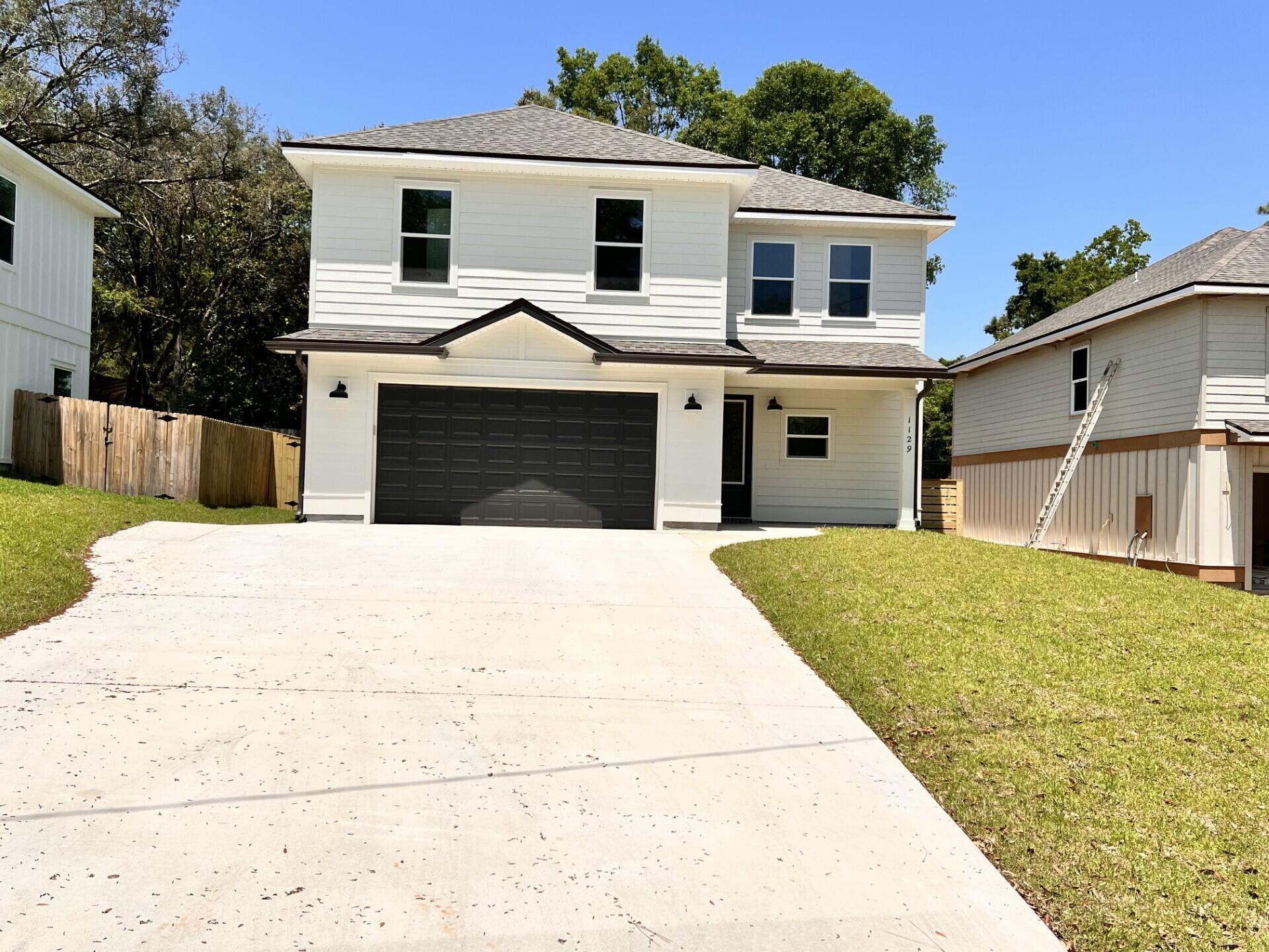 This Beautiful 4 bedroom, 2 1/2 bath home is located in the heart of Niceville, yet beautifully secluded at the end of a one-way street.  NO HOA!!  Boasting many upgrades and custom features.  If you like entertaining, you'll love this OPEN FLOOR PLAN, featuring 9 ft. ceilings throughout, an oversized garage 27.6x22.8, upgraded spray foam insulation in the roof. The kitchen is divine with white custom cabinets, soft close drawers, upgraded sink, GAS stove, walk in pantry, undermount lighting and quartz countertops throughout.  You'll really love all the LED recess lighting throughout the home, giving it a sharp, clean look.  If you've had a hard day at work, retreat to your amazing master bath.