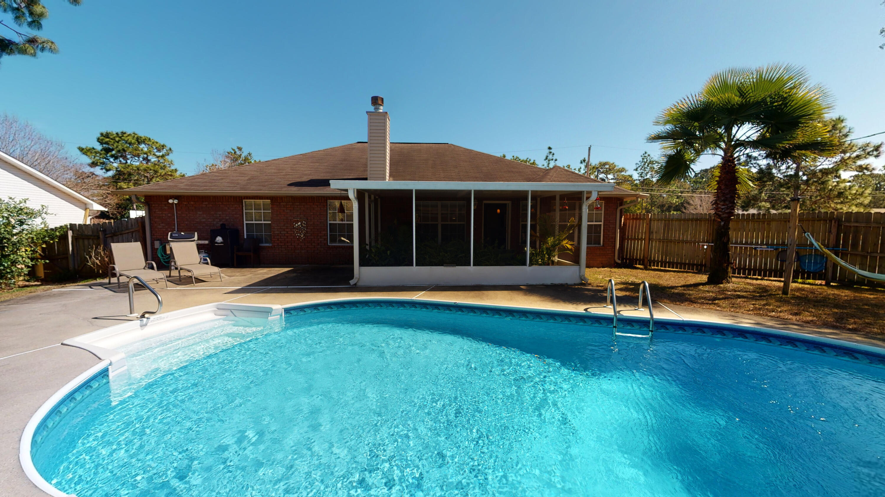Home....This 3 bedroom/2 bath All Brick Pool home is the retreat you will not want to leave.  Did I mention the In-Ground Pool , Privacy Fence and Screened-In Patio?  Inside this engaging home you will find a spacious and open Family Room with a soaring ceiling and wood laminate flooring open to the functional and Updated Kitchen with granite countertops, gorgeous cabinets and stainless appliances.  Desirable split bedroom floor plan with a large Master Bedroom and Master Bath with dual vanity, separate shower and garden tub with a large walk-in closet.  This delightful home is situated on a Quarter Acre Corner Lot in the Palmetto Ridge Subdivision with all the Holley By the Sea Amenities!  Water heater replaced in 2017 and HVAC replaced in 2016.  Washer and dryer hookups in the garage.