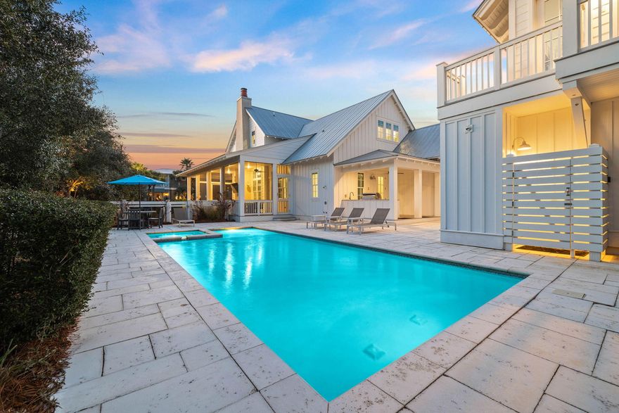 Welcome to 44 Seacrest Drive where coastal luxury meets southern charm. Ready for immediate enjoyment, this beautifully built home also presents a lucrative investment opportunity with rental projections at $286,895 annually. This residence offers both convenience and tranquility being just a 2 minute walk from the sand. Located in a neighborhood with no HOA costs, this investment property is able to run at peak performance with net income projections at $184,124 annually. Step inside to discover a meticulously curated interior where the dream kitchen showcases inset cabinetry along with Wolf & Sub-Zero appliances. Boasting quartz countertops, the large island is the perfect gathering space in the kitchen. The living room has been exquisitely designed with a gas fireplace & opulent furnishings. The screened-in porch features comfortables spaces for outdoor dining & lounging. Overlooking the pool, the outdoor kitchen has been fully equipped with a gas grill, refrigerator & sink. The backyard is an absolute oasis with its 34x16 heated private pool, bubbling spa & artificial turf yard. The charming home features six bedrooms, each offering a tranquil retreat at the end of the day. The main house offers living spaces on the first and second levels. The carriage house has been superbly designed with a full kitchen, roomy living/dining areas & long porch overlooking the pool. As an added bonus, the property has a 2 car garage along with a 140ft driveway. The property can easily accommodate up to 14 total guests. 44 Seacrest Drive has been diligently crafted to provide an unparalleled 30A experience. Tour this property today!