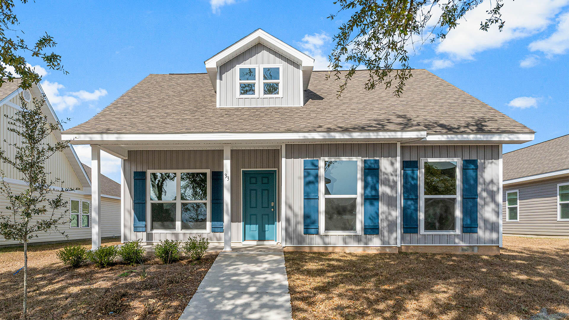 The Owl's Head community is conveniently located off of Highway 331 in Freeport. We are only 8 miles to Interstate 10, and 16 miles to beautiful beaches and Highway 30 A. We offer 6 floor plans, 3 and 4 bedrooms. All homes have rear entry garages. This community offers a community area with paved walking trails and a spring fed lake. | The Aspen plan is a single story 3 Bedroom, 2 Bath home. This floor plan features a covered front and back porch. There is a separate dining room to enjoy family dinners, or it could be used as a flex space. There is a large shower in the primary bedroom, with 2 separates sinks.