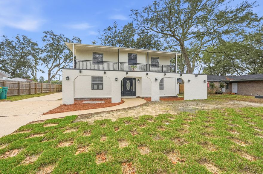 ***5 BR rentals are hard to find...especially with these beautiful updates!!*** Welcome home to this spacious five-bedroom, three-bath Mediterranean-style residence on a massive private lot in the heart of Niceville. Designed for both everyday comfort and convenient living, this two-story home has a spacious floor plan and short commutes to all that Niceville has to offer. Inside, the front entry is finished in timeless tile, while the formal dining room showcases real hardwood floors and a striking brick-enclosed wood-burning fireplace that adds warmth and character. Natural light fills the home, highlighting the open living areas and inviting sitting room. The eat-in kitchen is thoughtfully appointed with maple cabinetry, stone countertops, stylish stainless steel appliances, and ample space for casual dining. The first floor features a convenient bedroom, laundry room, and additional bathideal for guests or multi-generational living. Upstairs, the primary suite is a true retreat, complete with its own brick-surround fireplace, dual vanities, a tiled walk-in shower, separate water closet, walk-in closet, and linen storage. Additional upstairs bedrooms are generously sized and share a full bath with a shower-tub combination, large vanity, and ceiling fans, all bathed in natural light. A detached garage/large utility shed provide excellent storage and flexibility. With its thoughtful layout, classic finishes, and exceptional outdoor living spaces, this home offers comfort, style, and versatility in a desirable Niceville setting. Contact us today for your showing!!