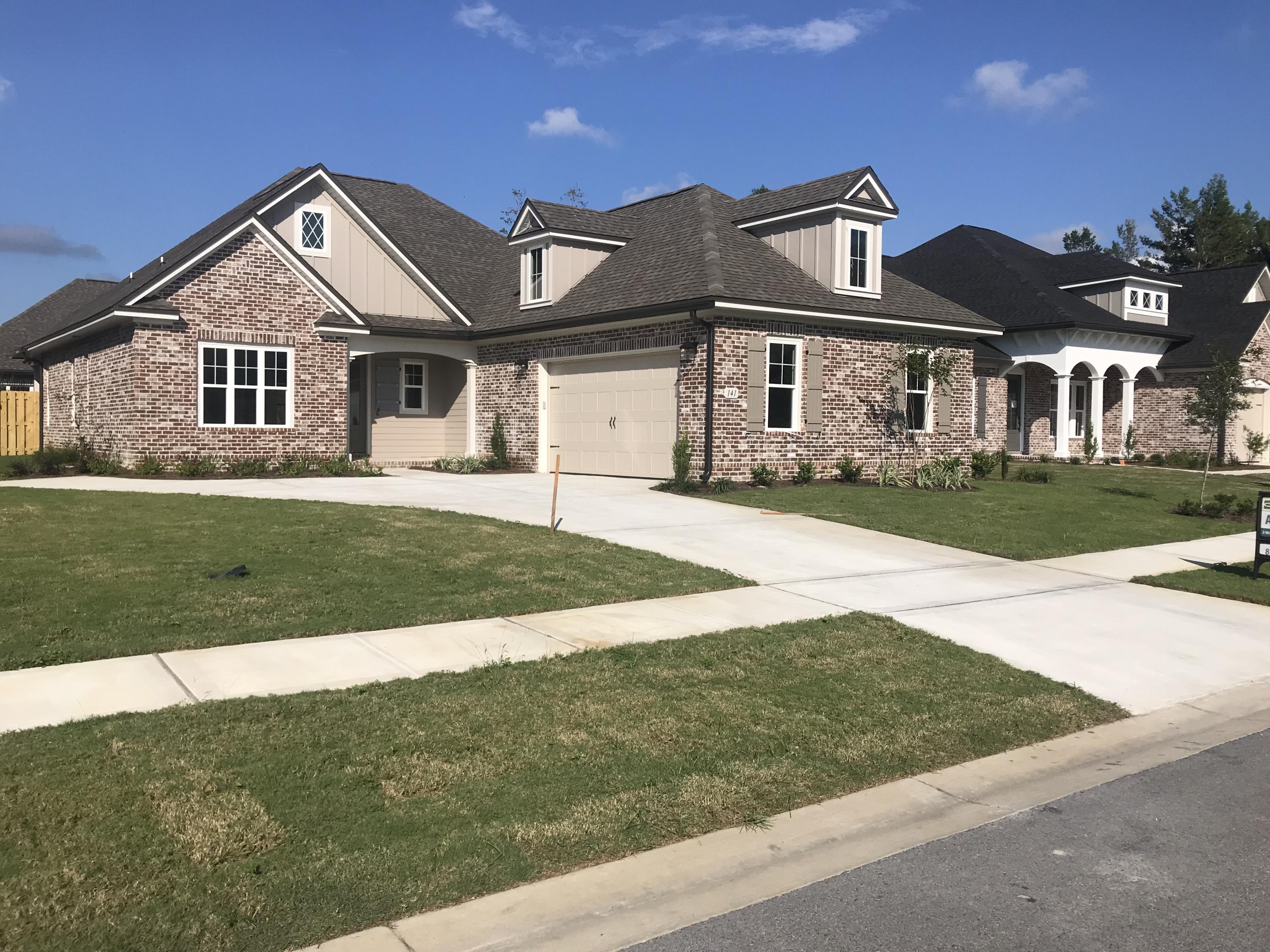 Renowned local home builder in sought after master planned community Hammock Bay available in the spring. Open floor plan with custom finishes throughout. Gourmet kitchen with stainless built in appliances including 5 burner gas cooktop and stainless vent hood. Built in oven and microwave. Huge walk in shower in master suite with 2 heads and great walk in closet. Stained French doors at study. Cabinets and sink in laundry. Extensive crown moulding, 5 1/4'' base moulding and cased window openings make this home stand above the rest. Tankless gas hot water heater, sprinkler system with well included as well. Large back porch with a great yard make this the perfect home for your buyers!!